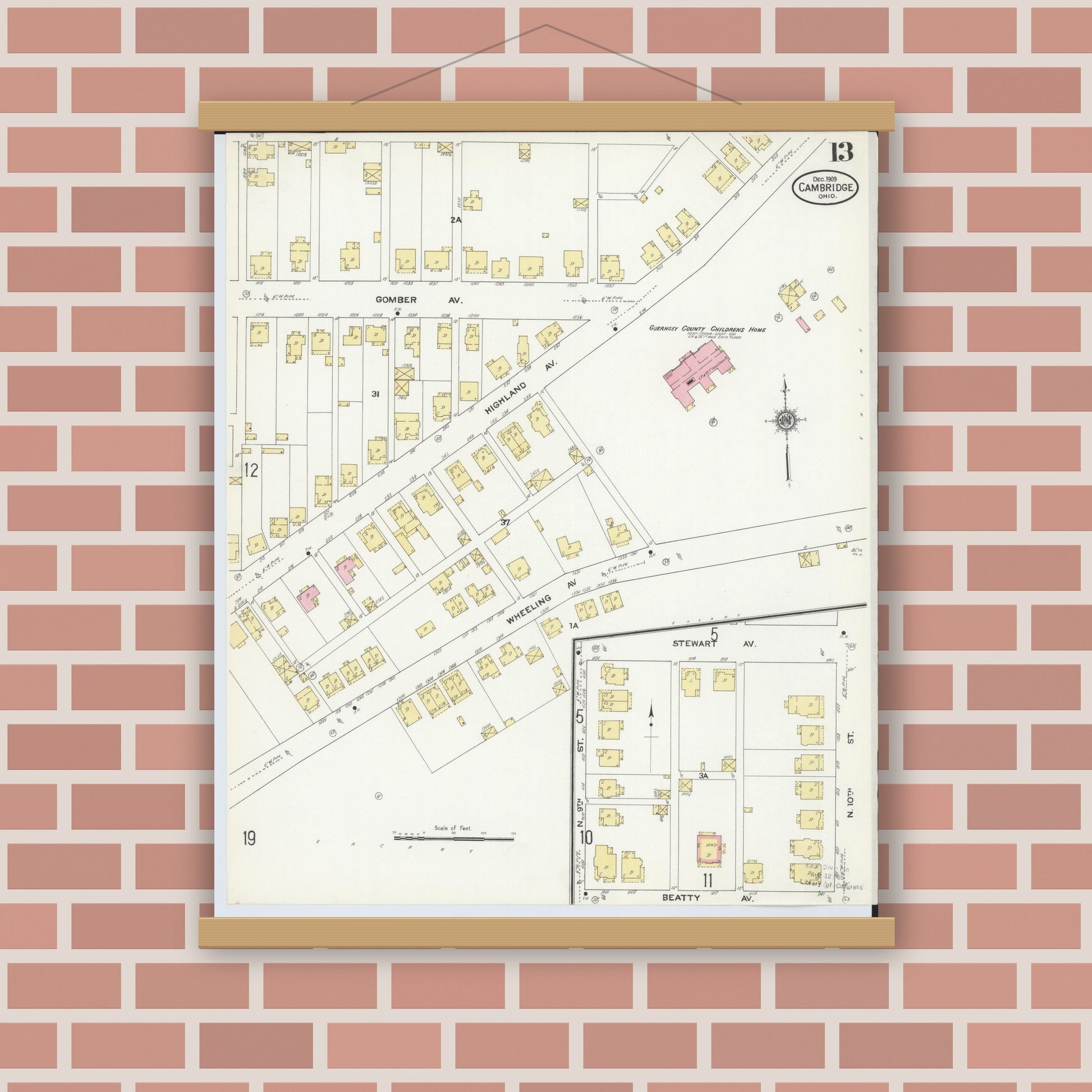 Old map wall art mockup — magnetic wood frame on brick wall — Sanborn Fire Insurance Map from Cambridge, Guernsey County, Ohio (1909), Sheet #0013