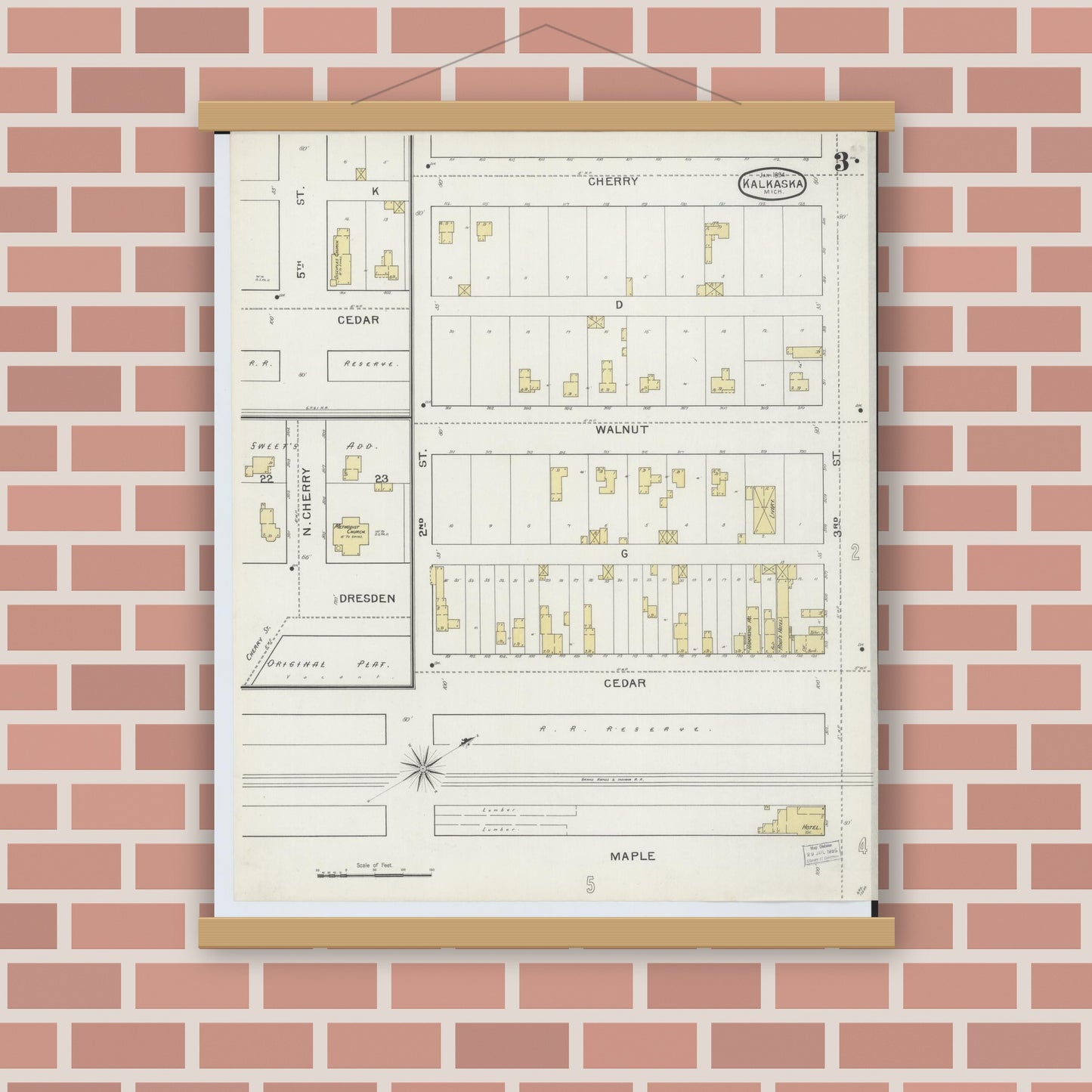 Old map wall art mockup — magnetic wood frame on brick wall — Sanborn Fire Insurance Map from Kalkaska, Kalkaska County, Michigan (1894), Sheet #0003