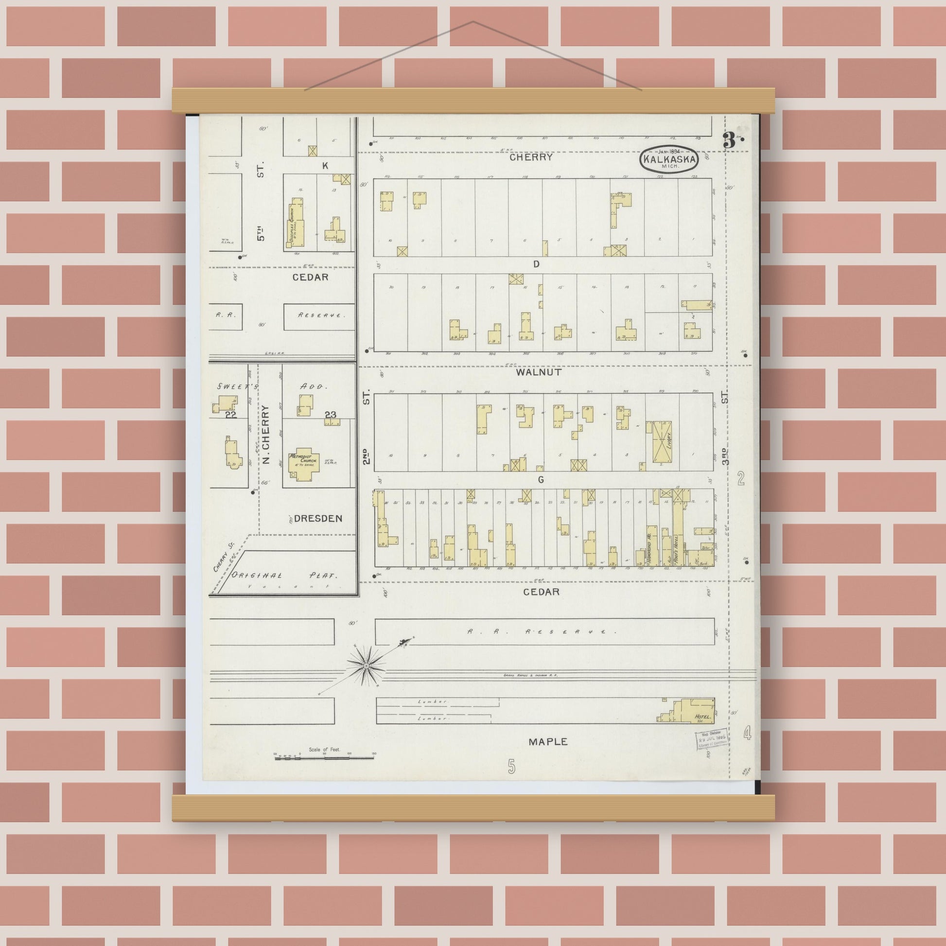 Old map wall art mockup — magnetic wood frame on brick wall — Sanborn Fire Insurance Map from Kalkaska, Kalkaska County, Michigan (1894), Sheet #0003