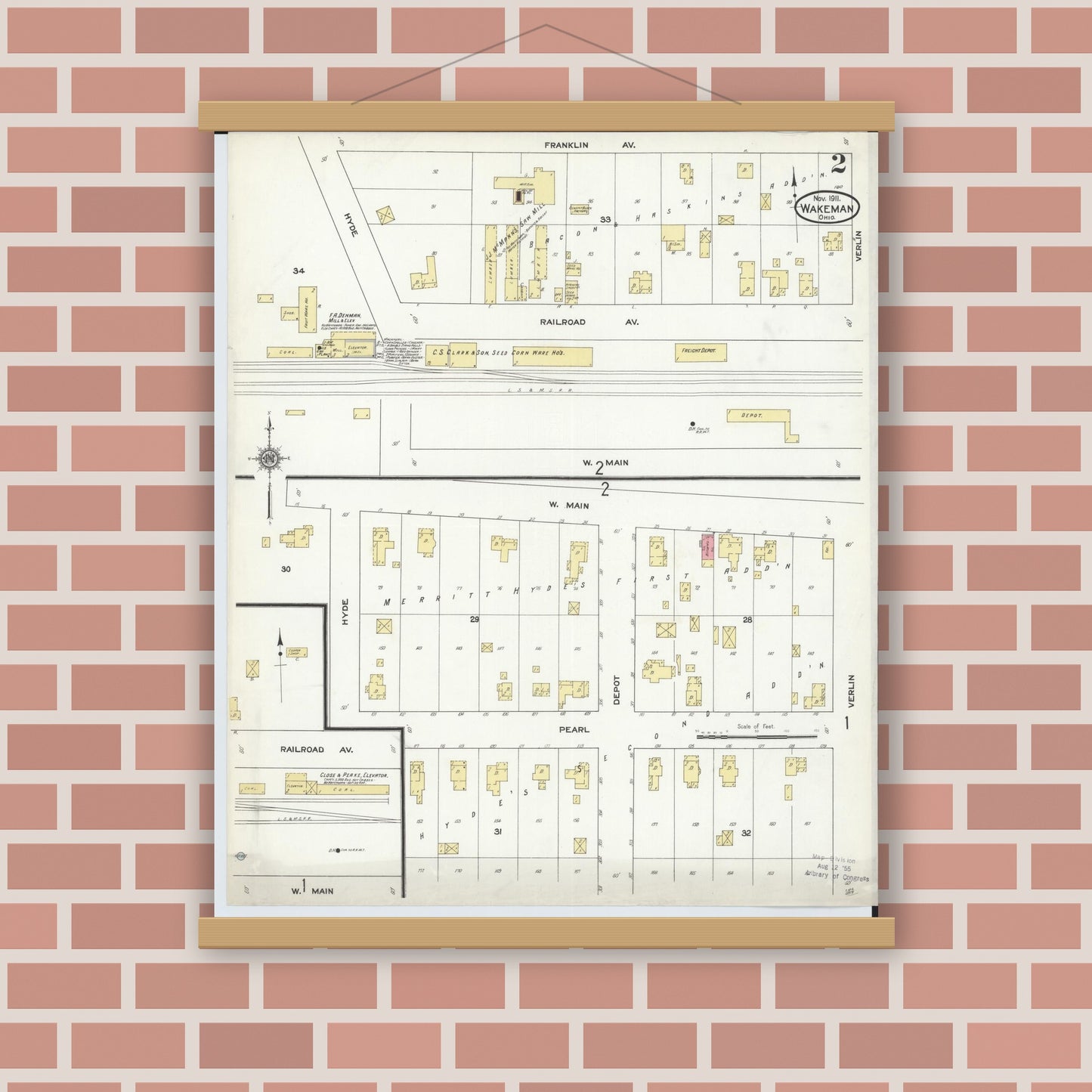 Old map wall art mockup — magnetic wood frame on brick wall — Sanborn Fire Insurance Map from Wakeman, Huron County, Ohio (1911), Sheet #0002