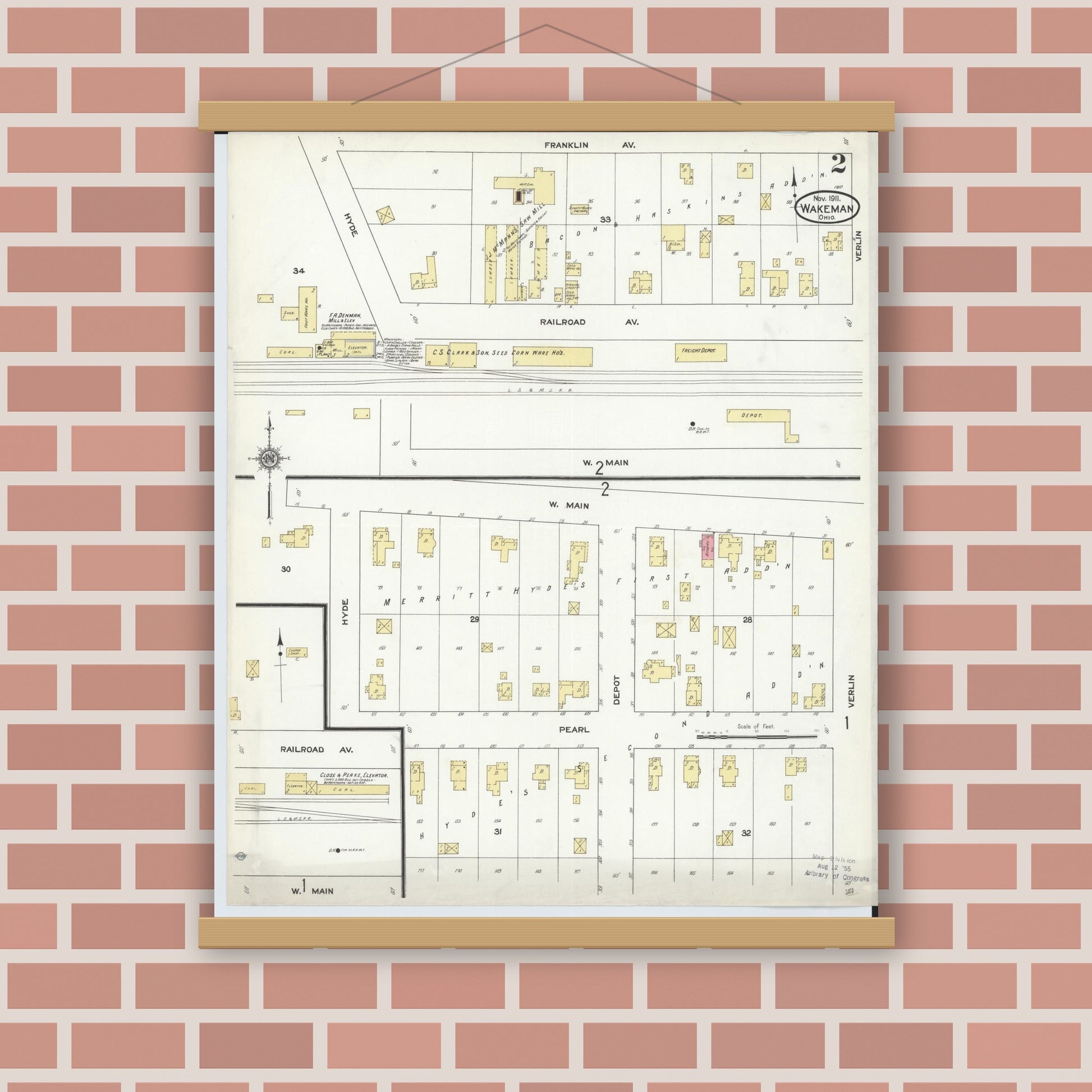 Old map wall art mockup — magnetic wood frame on brick wall — Sanborn Fire Insurance Map from Wakeman, Huron County, Ohio (1911), Sheet #0002