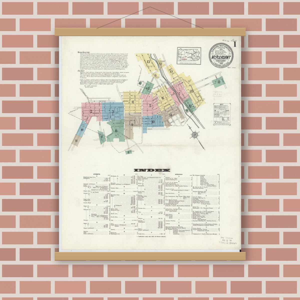 Old map wall art mockup — magnetic wood frame on brick wall — Sanborn Fire Insurance Map from Mount Pleasant, Westmoreland County, Pennsylvania (1914) - Complete Map Set