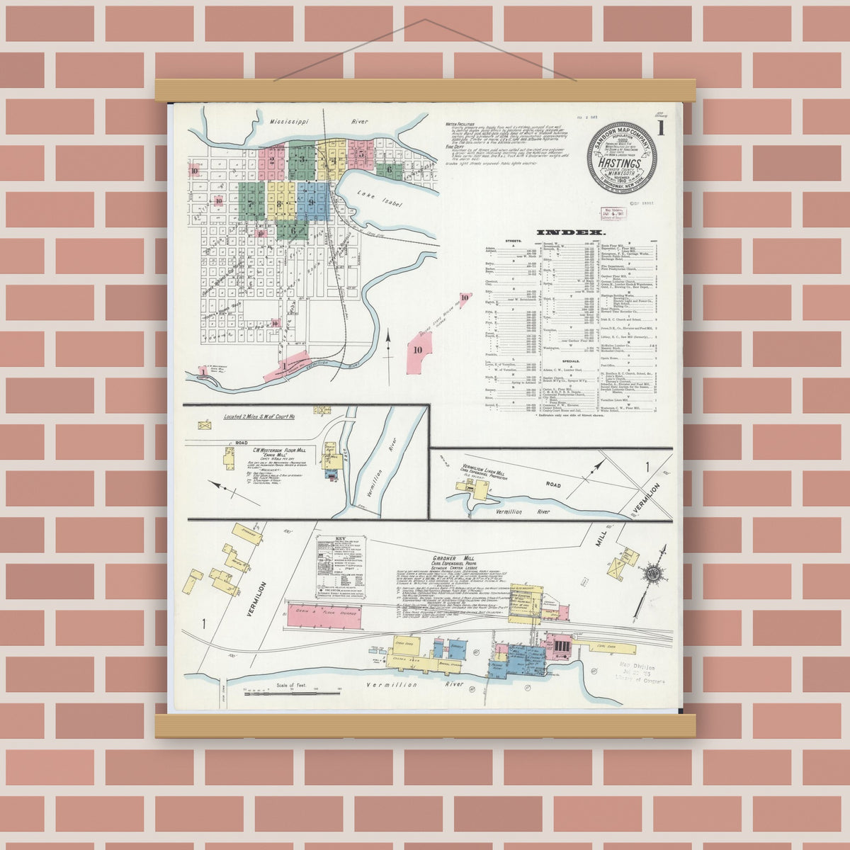 Old map wall art mockup — magnetic wood frame on brick wall — Sanborn Fire Insurance Map from Hastings, Dakota County, Minnesota (1910), Sheet #0001
