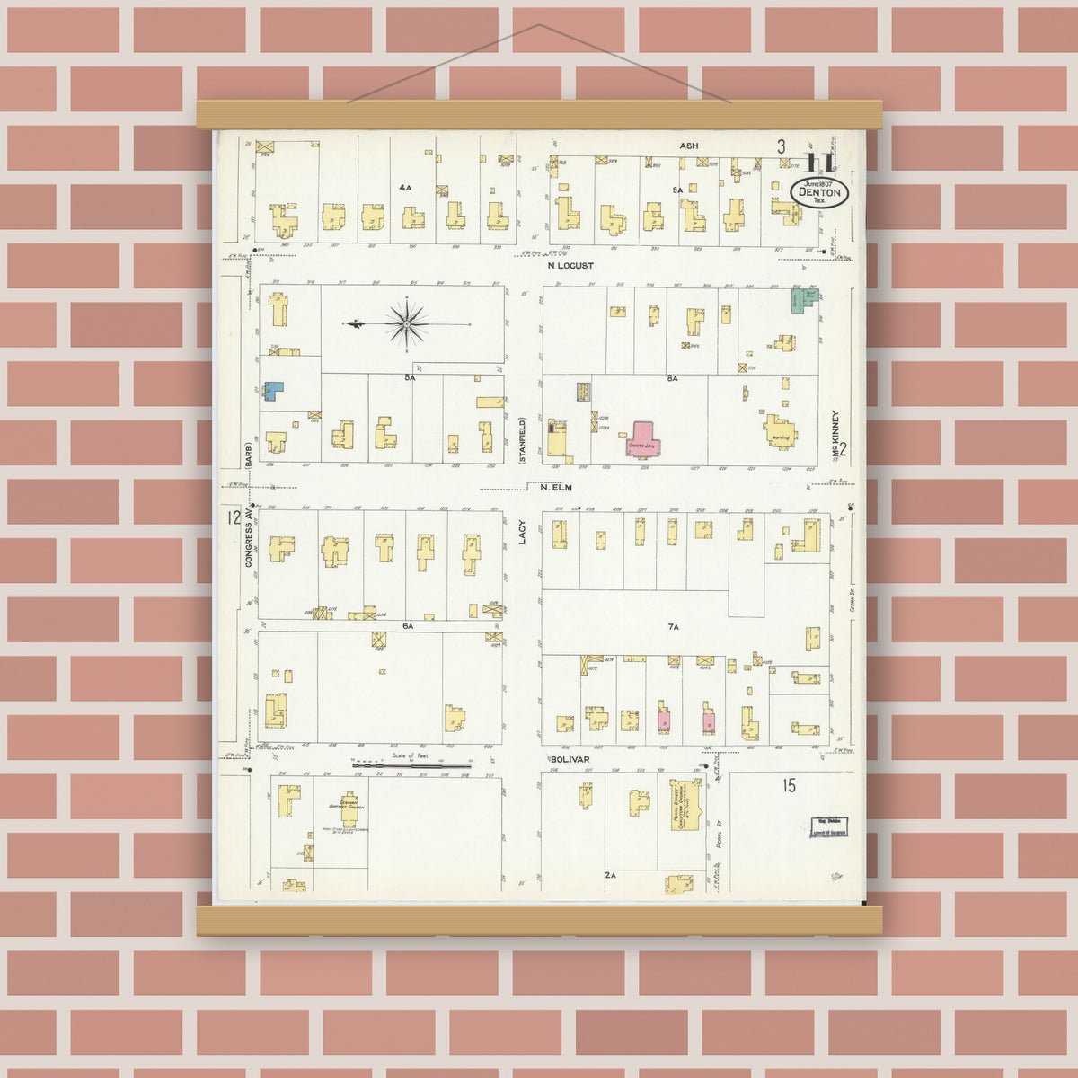 Old map wall art mockup — magnetic wood frame on brick wall — Sanborn Fire Insurance Map from Denton, Denton County, Texas (1907), Sheet #0011