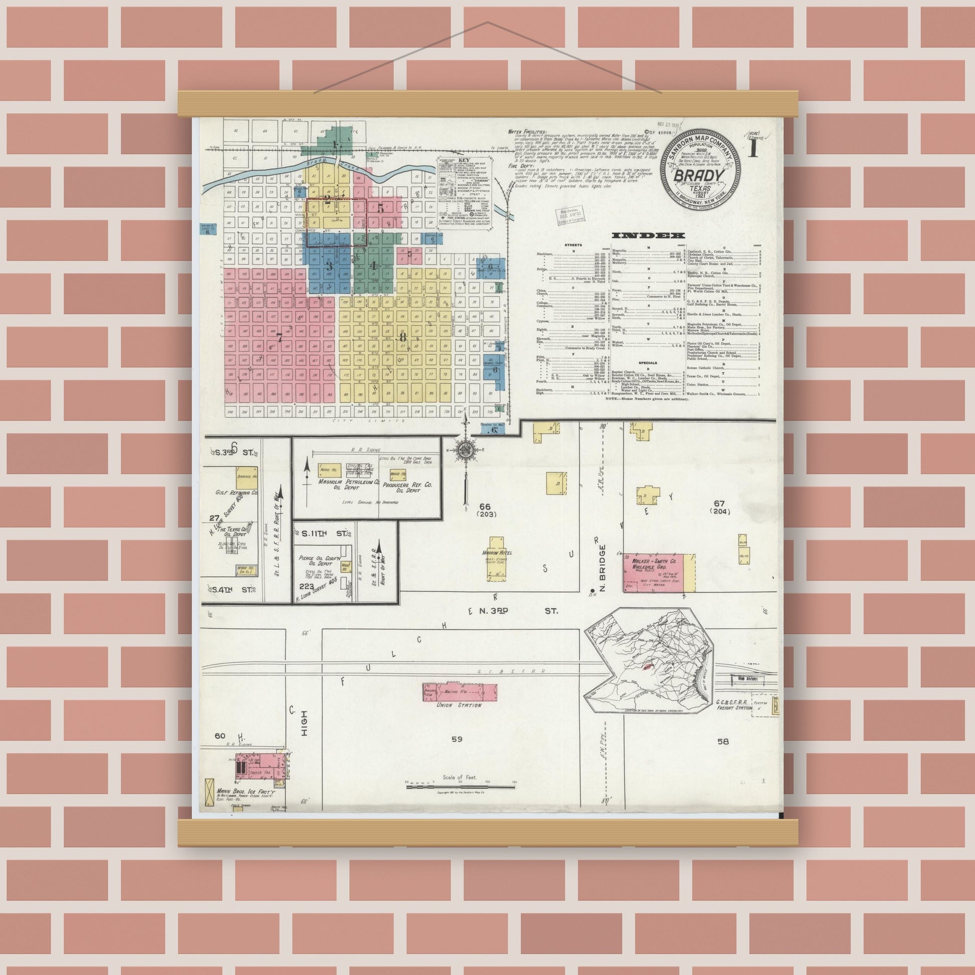 Old map wall art mockup — magnetic wood frame on brick wall — Sanborn Fire Insurance Map from Brady, McCulloch County, Texas (1921), Sheet #0001