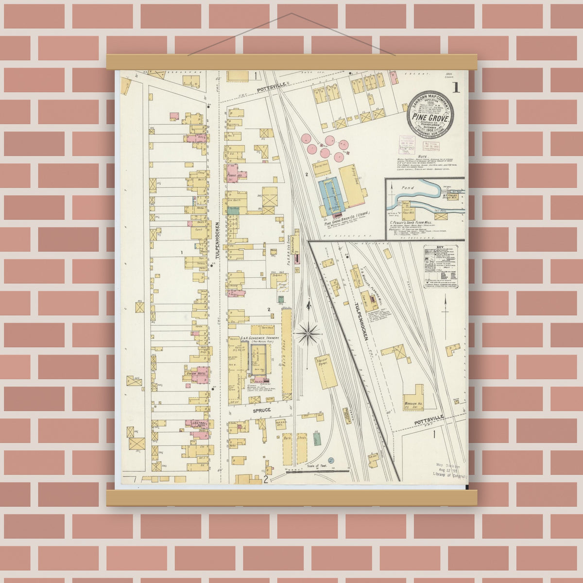 Old map wall art mockup — magnetic wood frame on brick wall — Sanborn Fire Insurance Map from Pine Grove, Schuylkill County, Pennsylvania (1902), Sheet #0001