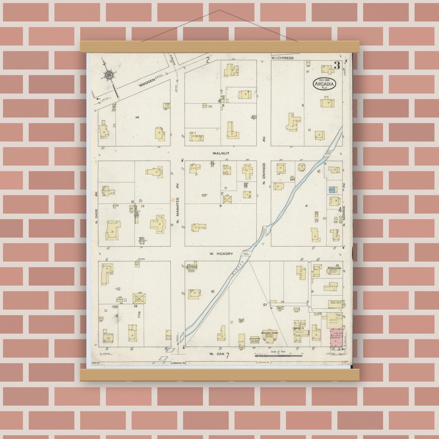 Old map wall art mockup — magnetic wood frame on brick wall — Sanborn Fire Insurance Map from Arcadia, DeSoto County, Florida (1914), Sheet #0003