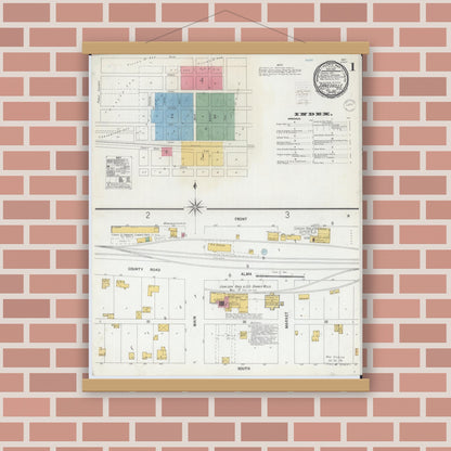 Old map wall art mockup — magnetic wood frame on brick wall — Sanborn Fire Insurance Map from Janesville, Waseca County, Minnesota (1900), Sheet #0001