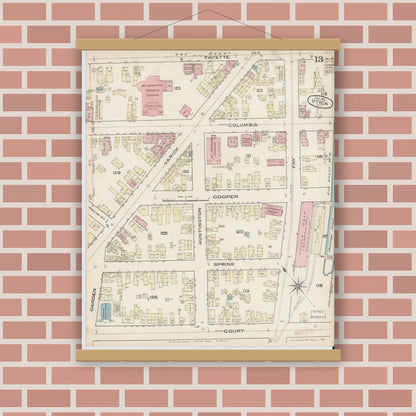 Old map wall art mockup — magnetic wood frame on brick wall — Sanborn Fire Insurance Map from Utica, Oneida County, New York (1884), Sheet #0013