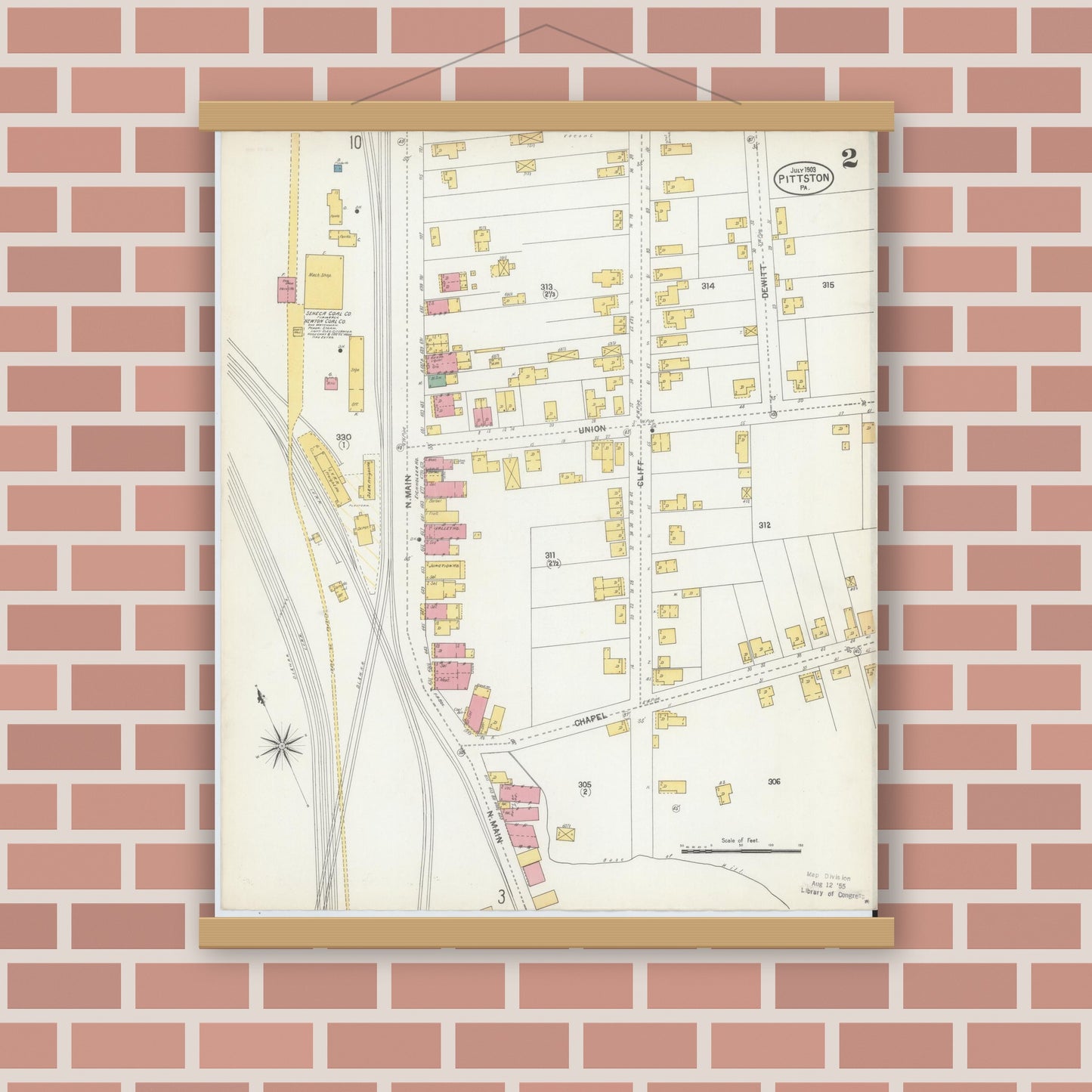Old map wall art mockup — magnetic wood frame on brick wall — Sanborn Fire Insurance Map from Pittston, Luzerne County, Pennsylvania (1903), Sheet #0002
