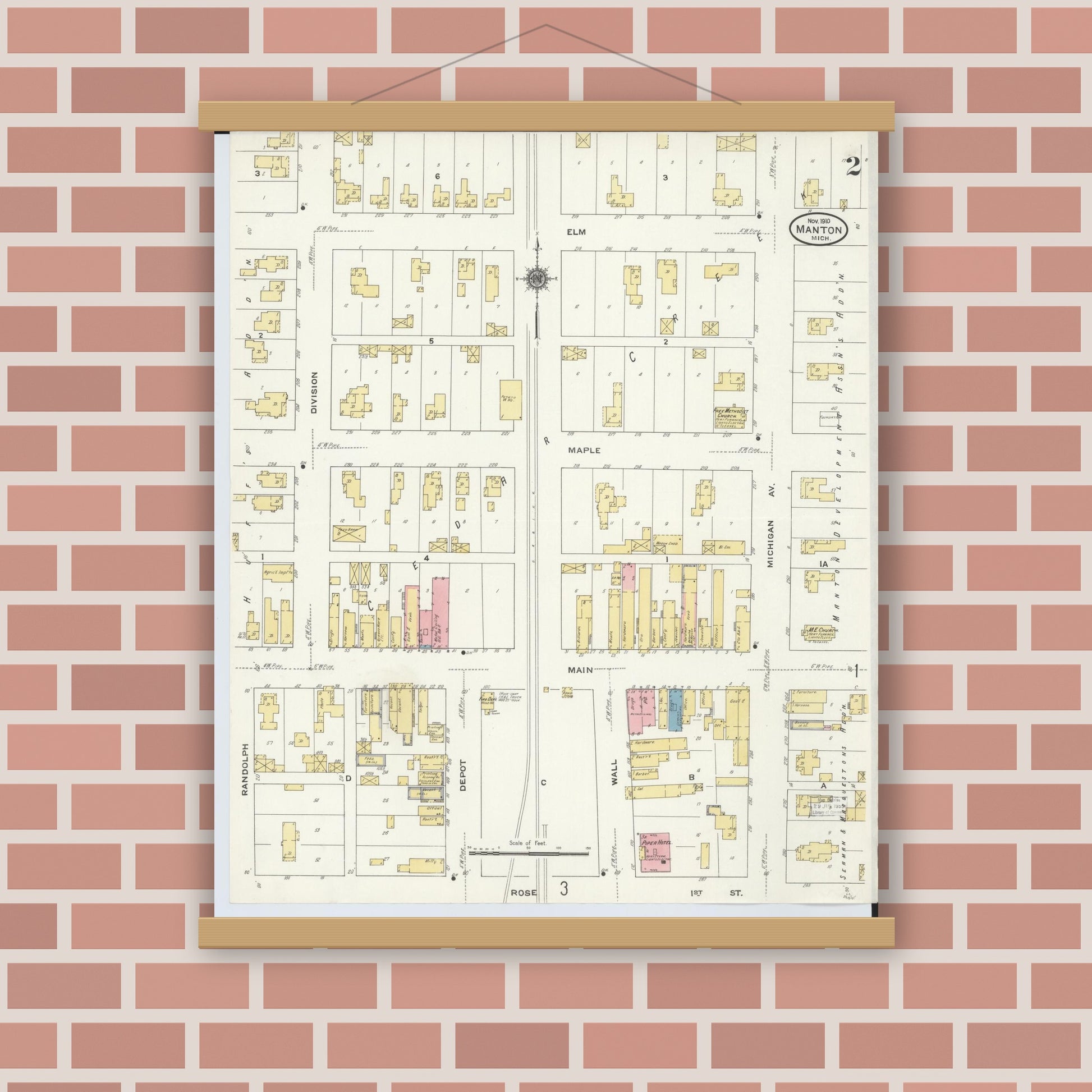 Old map wall art mockup — magnetic wood frame on brick wall — Sanborn Fire Insurance Map from Manton, Wexford County, Michigan (1910), Sheet #0002