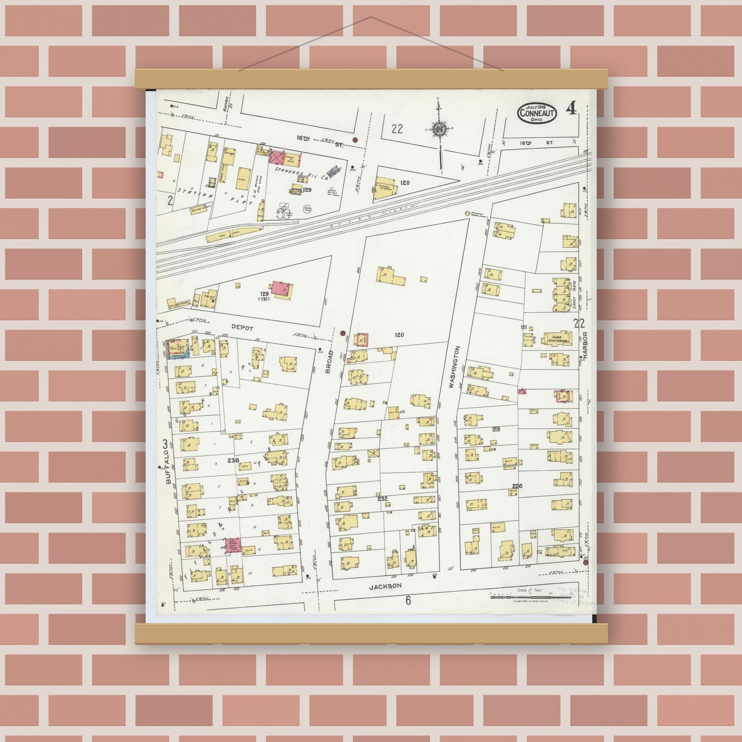 Old map wall art mockup — magnetic wood frame on brick wall — Sanborn Fire Insurance Map from Conneaut, Ashtabula County, Ohio (1919), Sheet #0004