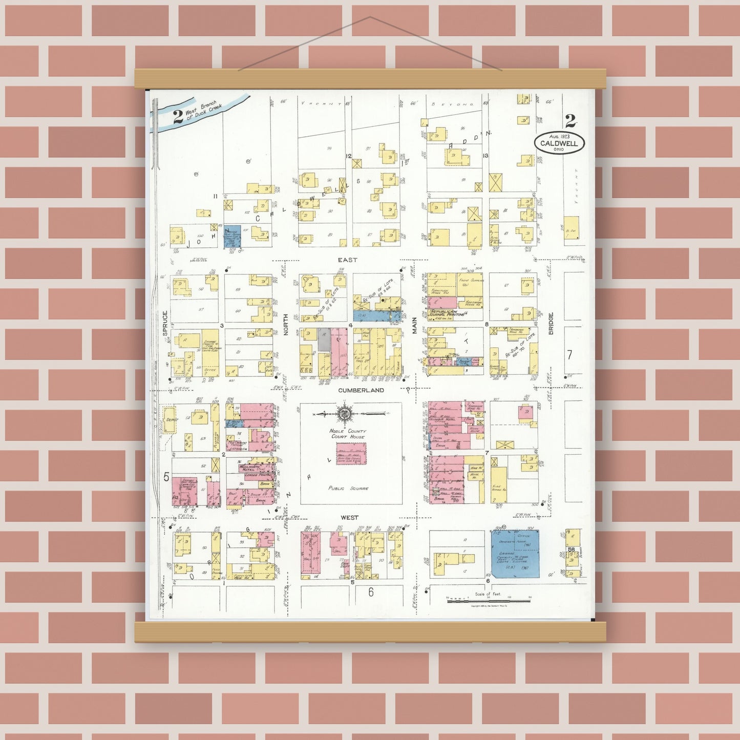Old map wall art mockup — magnetic wood frame on brick wall — Sanborn Fire Insurance Map from Caldwell, Noble County, Ohio (1923), Sheet #0002