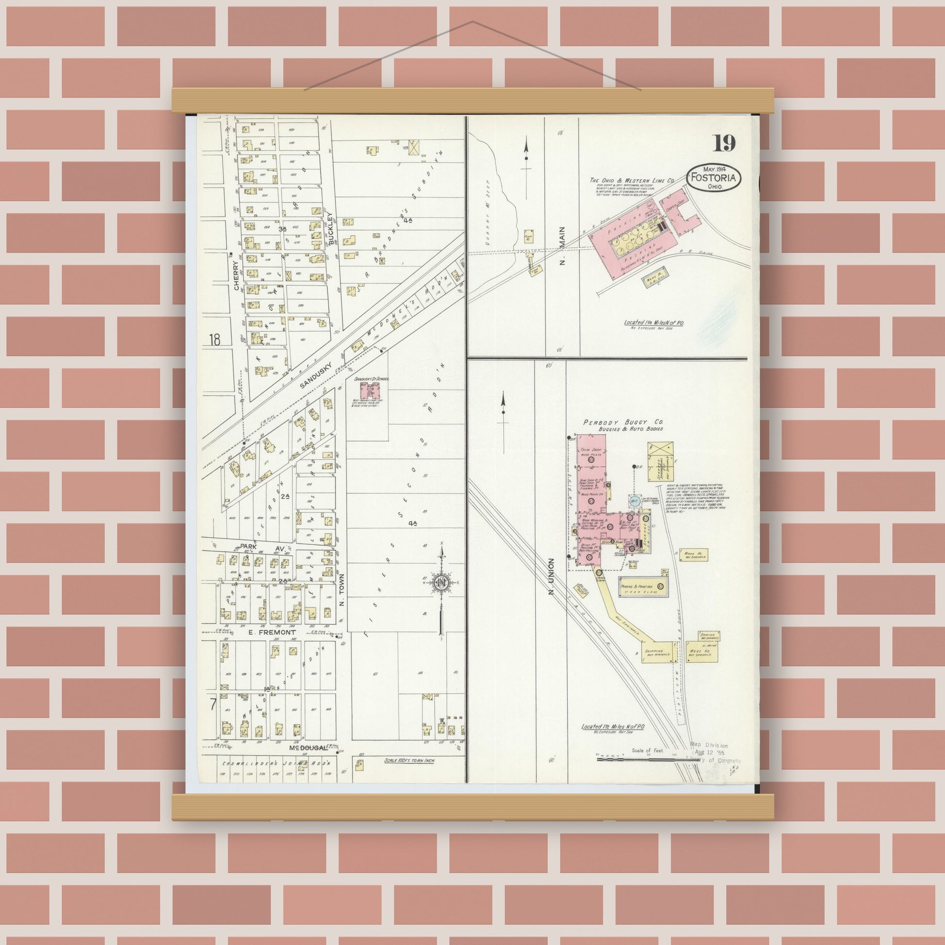 Old map wall art mockup — magnetic wood frame on brick wall — Sanborn Fire Insurance Map from Fostoria, Seneca, Hancock, And Wood Counties, Ohio (1914), Sheet #0019