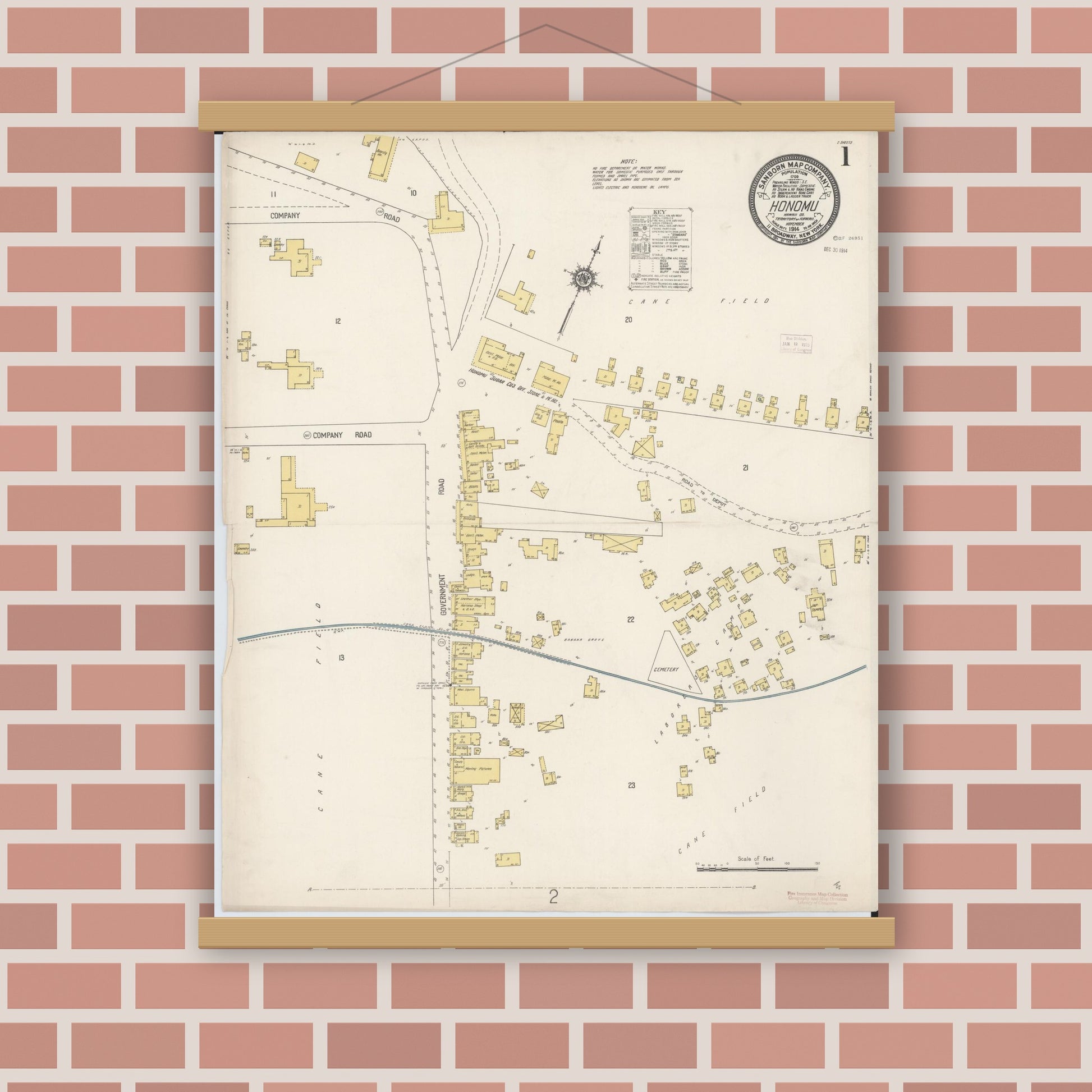 Old map wall art mockup — magnetic wood frame on brick wall — Sanborn Fire Insurance Map from Honomu, Hawaii County, Hawaii (1914) - Complete Map Set