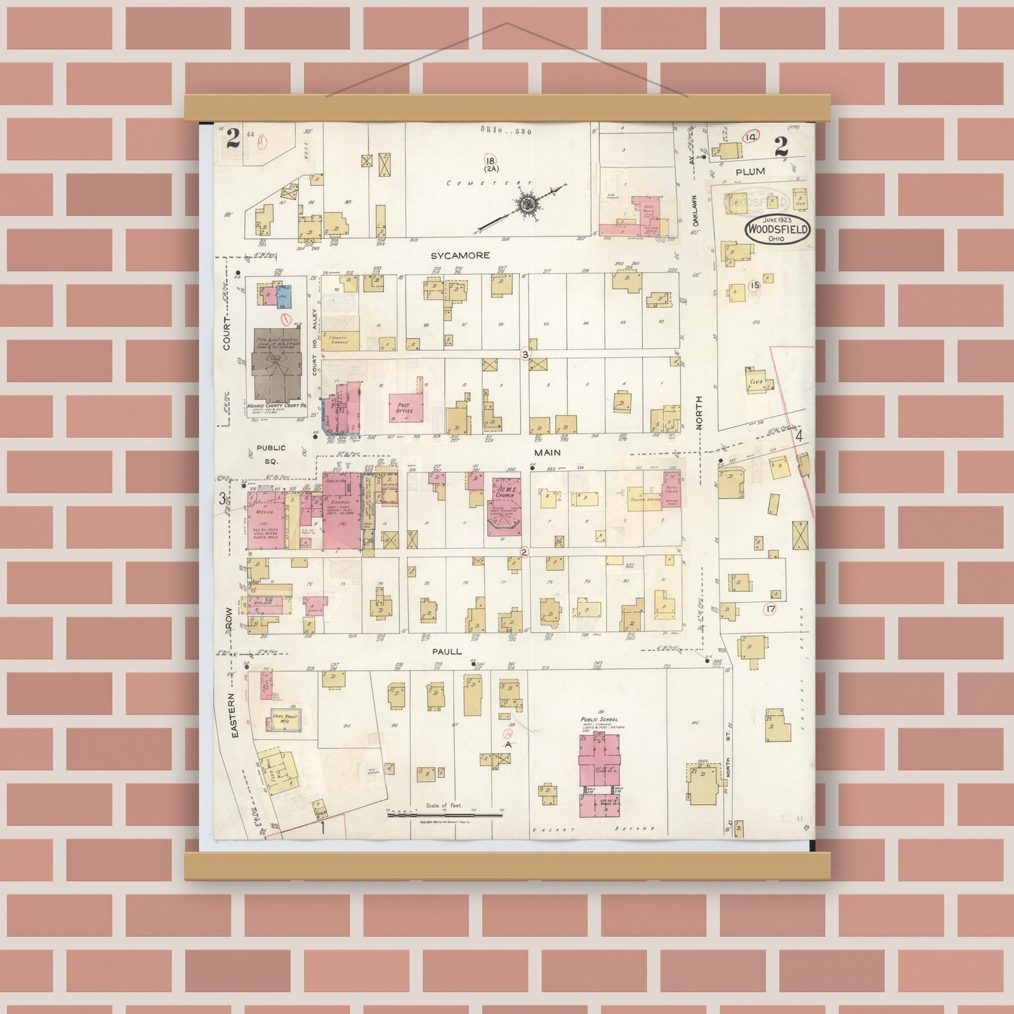 Old map wall art mockup — magnetic wood frame on brick wall — Sanborn Fire Insurance Map from Woodsfield, Monroe County, Ohio (1949), Sheet #0002