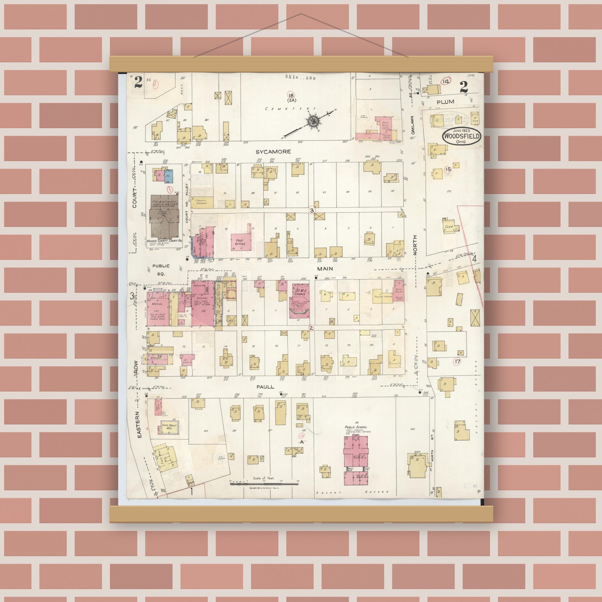 Old map wall art mockup — magnetic wood frame on brick wall — Sanborn Fire Insurance Map from Woodsfield, Monroe County, Ohio (1949), Sheet #0002
