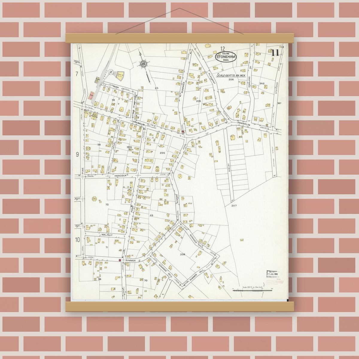 Old map wall art mockup — magnetic wood frame on brick wall — Sanborn Fire Insurance Map from Stoneham, Middlesex County, Massachusetts (1916), Sheet #0011