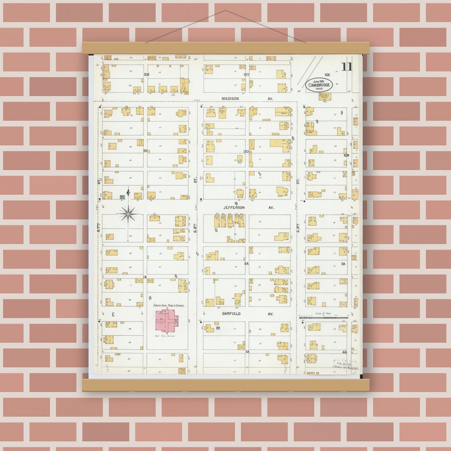 Old map wall art mockup — magnetic wood frame on brick wall — Sanborn Fire Insurance Map from Cambridge, Guernsey County, Ohio (1901), Sheet #0011