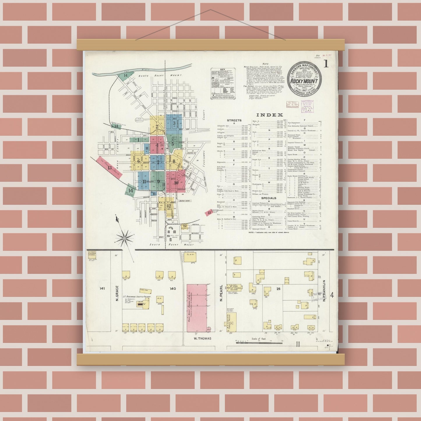 Old map wall art mockup — magnetic wood frame on brick wall — Sanborn Fire Insurance Map from Rocky Mount, Edgecombe And Nash Counties, North Carolina (1907) - Complete Map Set