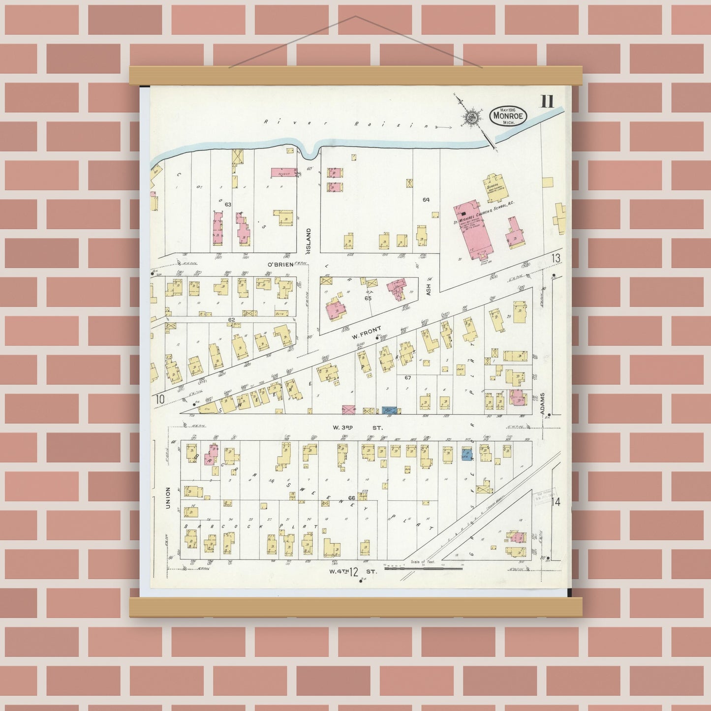 Old map wall art mockup — magnetic wood frame on brick wall — Sanborn Fire Insurance Map from Monroe, Monroe County, Michigan (1916), Sheet #0011