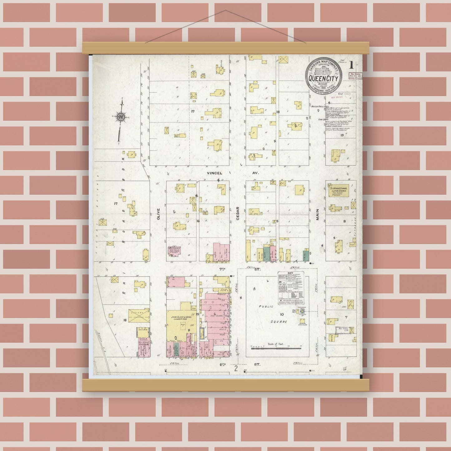 Old map wall art mockup — magnetic wood frame on brick wall — Sanborn Fire Insurance Map from Queen City, Schuyler County, Missouri (1910), Sheet #0001