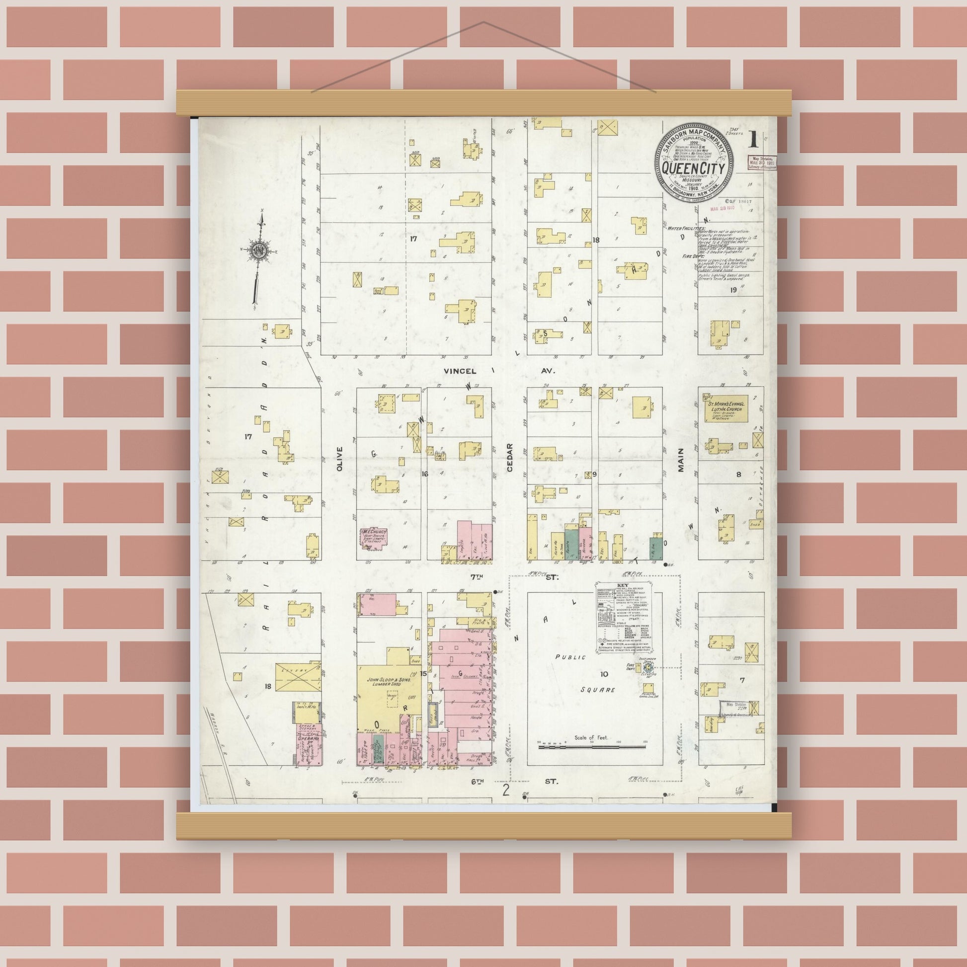 Old map wall art mockup — magnetic wood frame on brick wall — Sanborn Fire Insurance Map from Queen City, Schuyler County, Missouri (1910), Sheet #0001