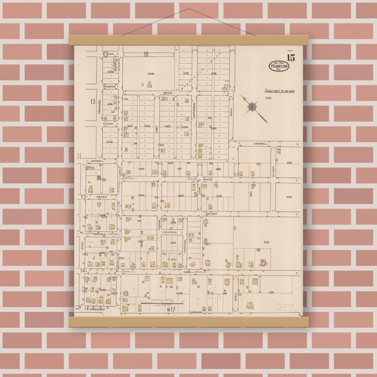 Old map wall art mockup — magnetic wood frame on brick wall — Sanborn Fire Insurance Map from Yoakum, De Witt And Lavaca Counties, Texas (1922), Sheet #0015