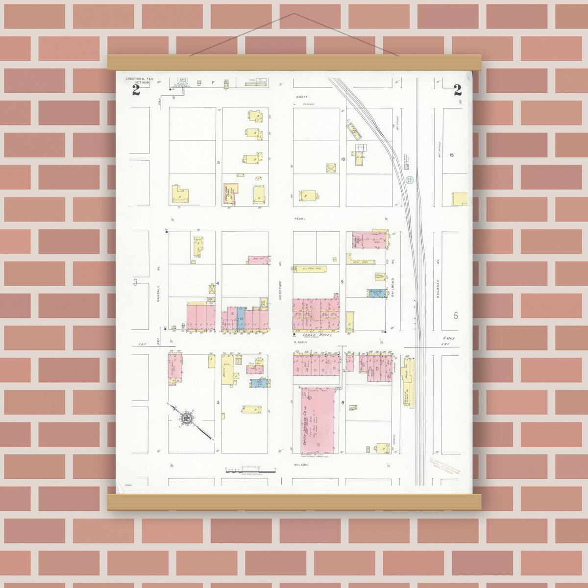 Old map wall art mockup — magnetic wood frame on brick wall — Sanborn Fire Insurance Map from Crestview, Okaloosa County, Florida (1939), Sheet #0002