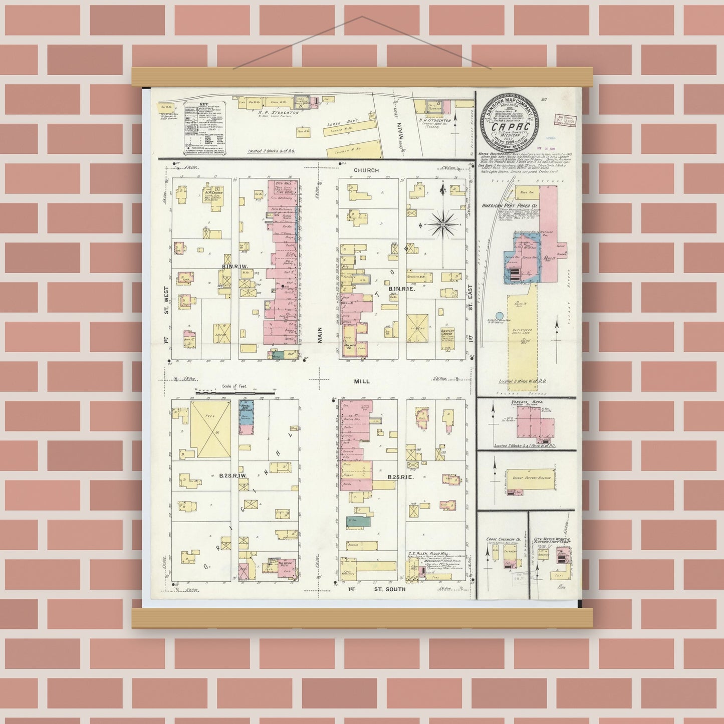 Old map wall art mockup — magnetic wood frame on brick wall — Sanborn Fire Insurance Map from Capac, Saint Clair County, Michigan (1909), Sheet #0001