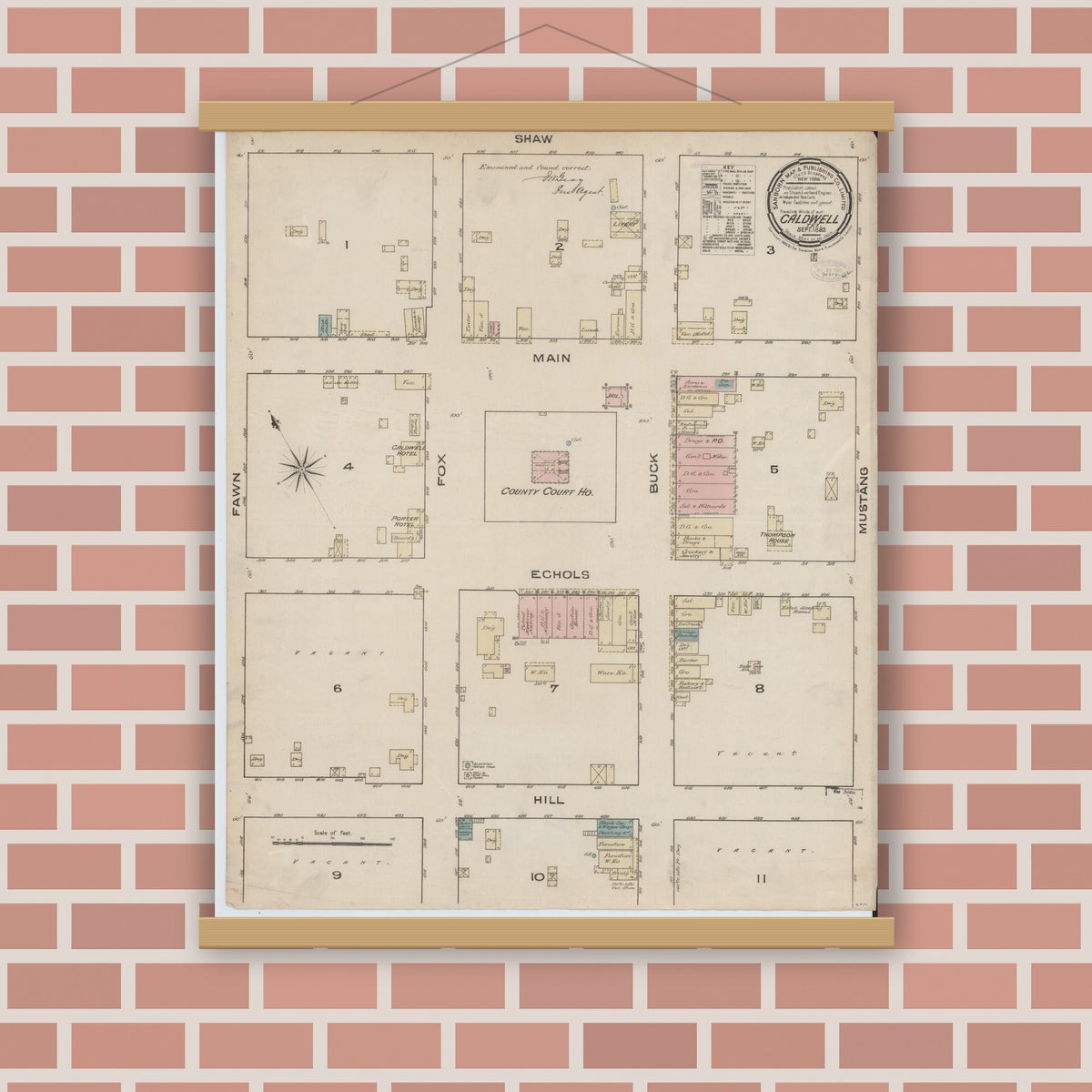 Old map wall art mockup — magnetic wood frame on brick wall — Sanborn Fire Insurance Map from Caldwell, Burleson County, Texas (1885), Sheet #0001