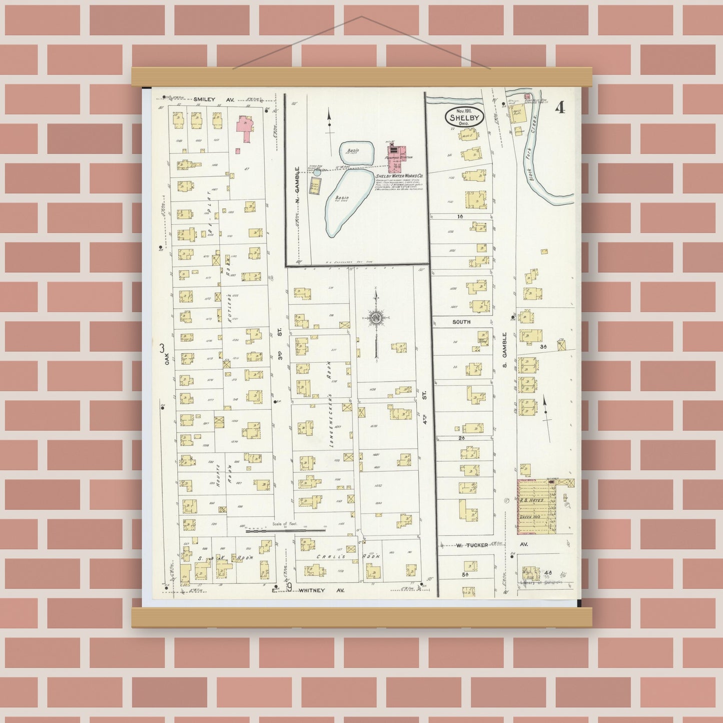 Old map wall art mockup — magnetic wood frame on brick wall — Sanborn Fire Insurance Map from Shelby, Richland County, Ohio (1911), Sheet #0004