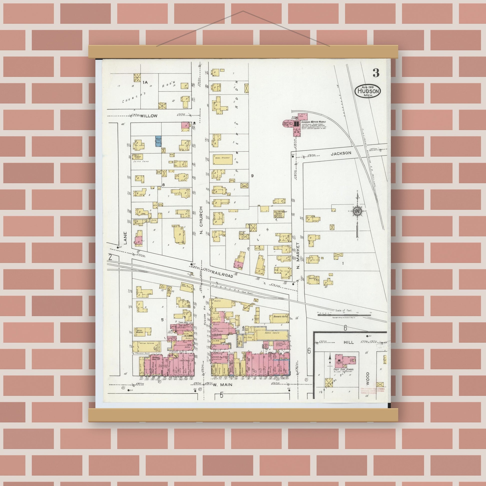 Old map wall art mockup — magnetic wood frame on brick wall — Sanborn Fire Insurance Map from Hudson, Lenawee County, Michigan (1919), Sheet #0003