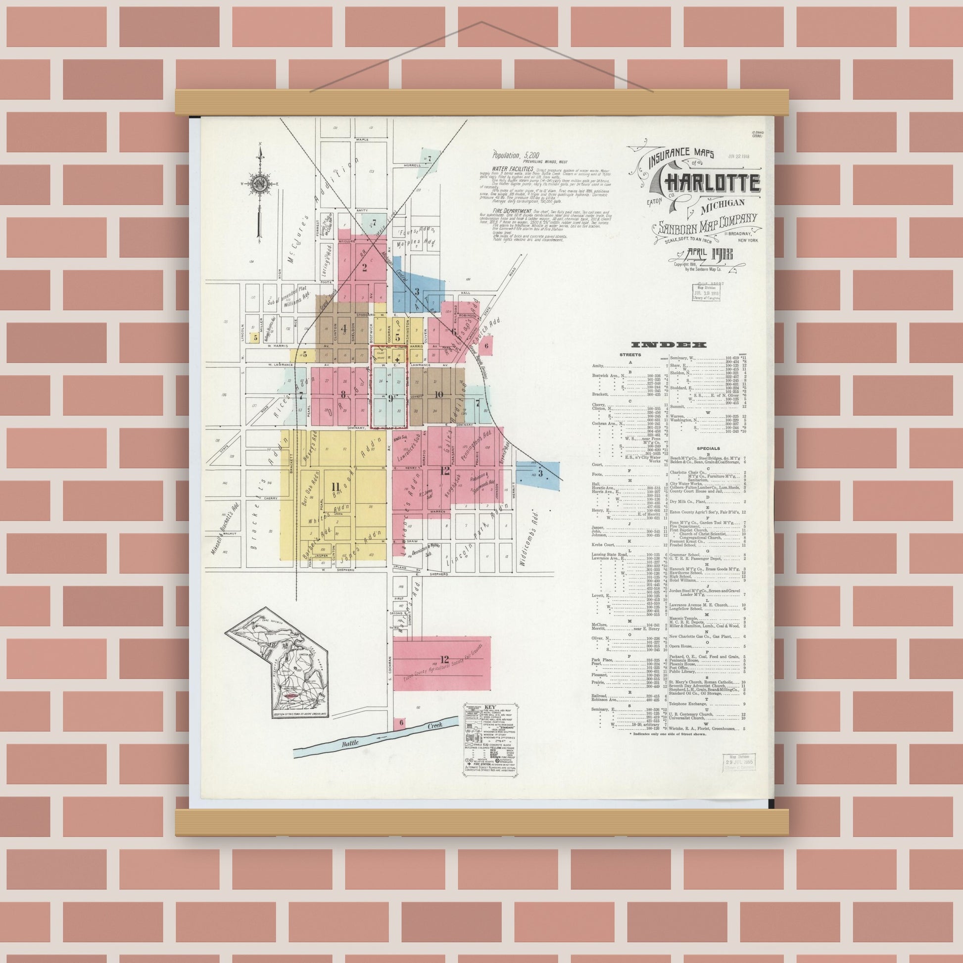 Old map wall art mockup — magnetic wood frame on brick wall — Sanborn Fire Insurance Map from Charlotte, Eaton County, Michigan (1918), Sheet #0001