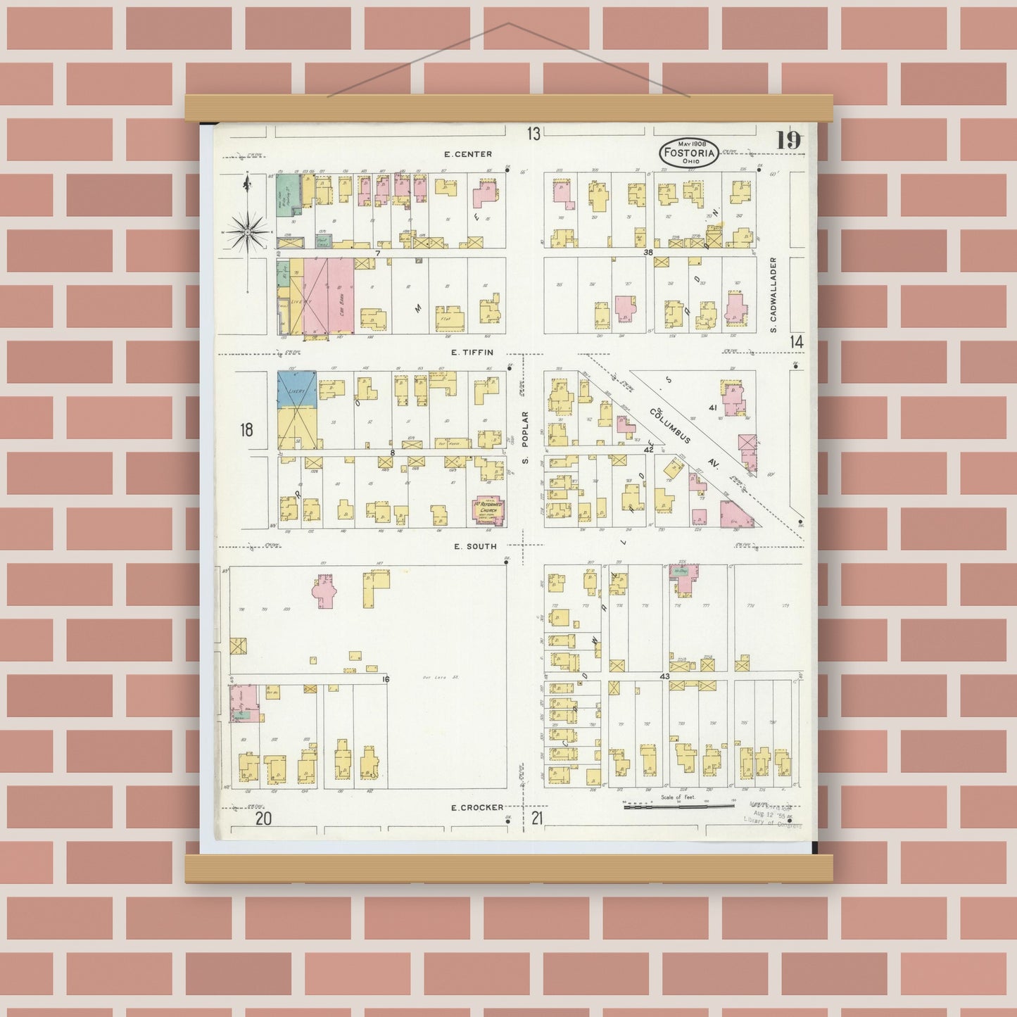 Old map wall art mockup — magnetic wood frame on brick wall — Sanborn Fire Insurance Map from Fostoria, Seneca, Hancock, And Wood Counties, Ohio (1908), Sheet #0019