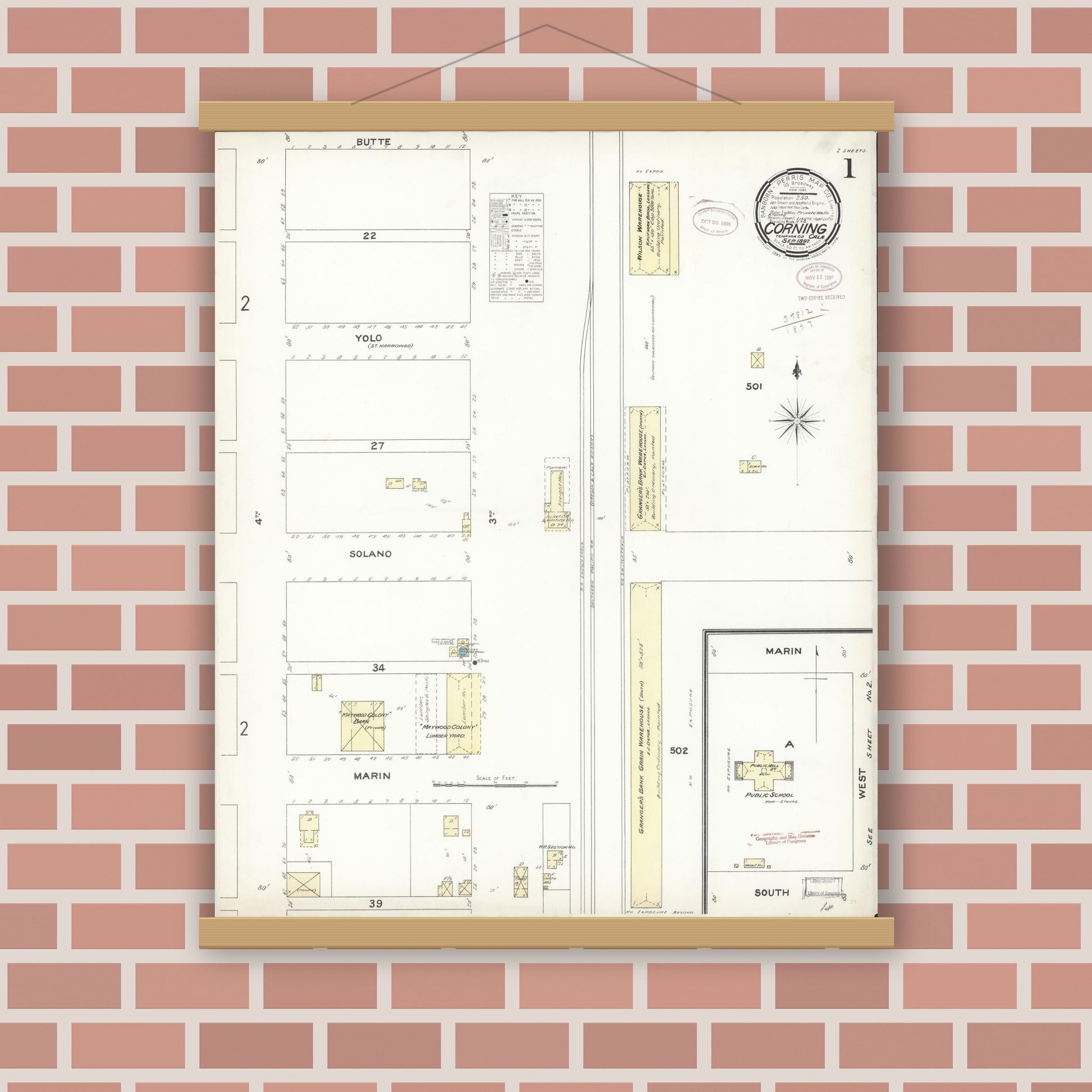 Old map wall art mockup — magnetic wood frame on brick wall — Sanborn Fire Insurance Map from Corning, Tehama County, California (1897), Sheet #0001
