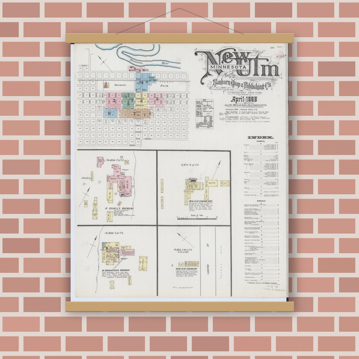 Old map wall art mockup — magnetic wood frame on brick wall — Sanborn Fire Insurance Map from New Ulm, Brown County, Minnesota (1889), Sheet #0001