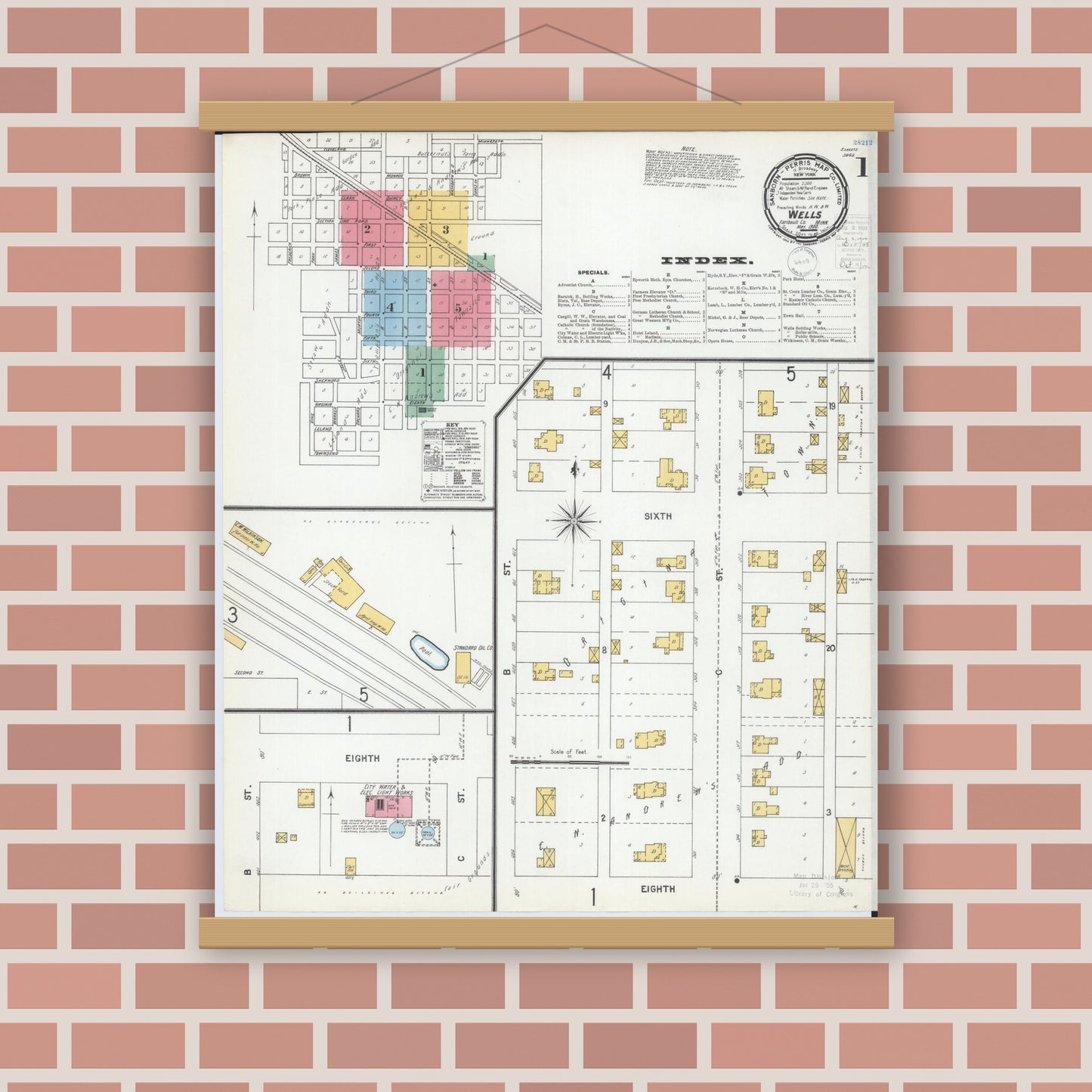 Old map wall art mockup — magnetic wood frame on brick wall — Sanborn Fire Insurance Map from Wells, Faribault County, Minnesota (1900), Sheet #0001