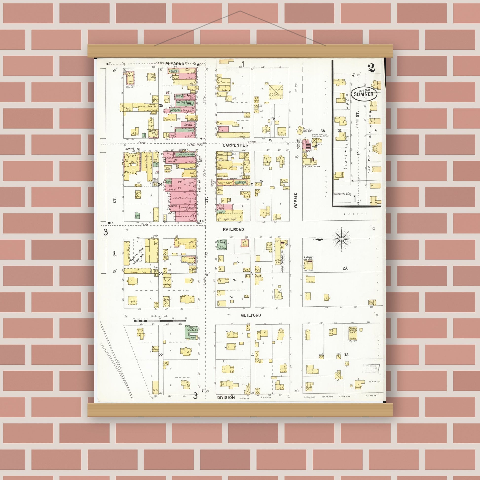 Old map wall art mockup — magnetic wood frame on brick wall — Sanborn Fire Insurance Map from Sumner, Bremer County, Iowa (1900), Sheet #0002