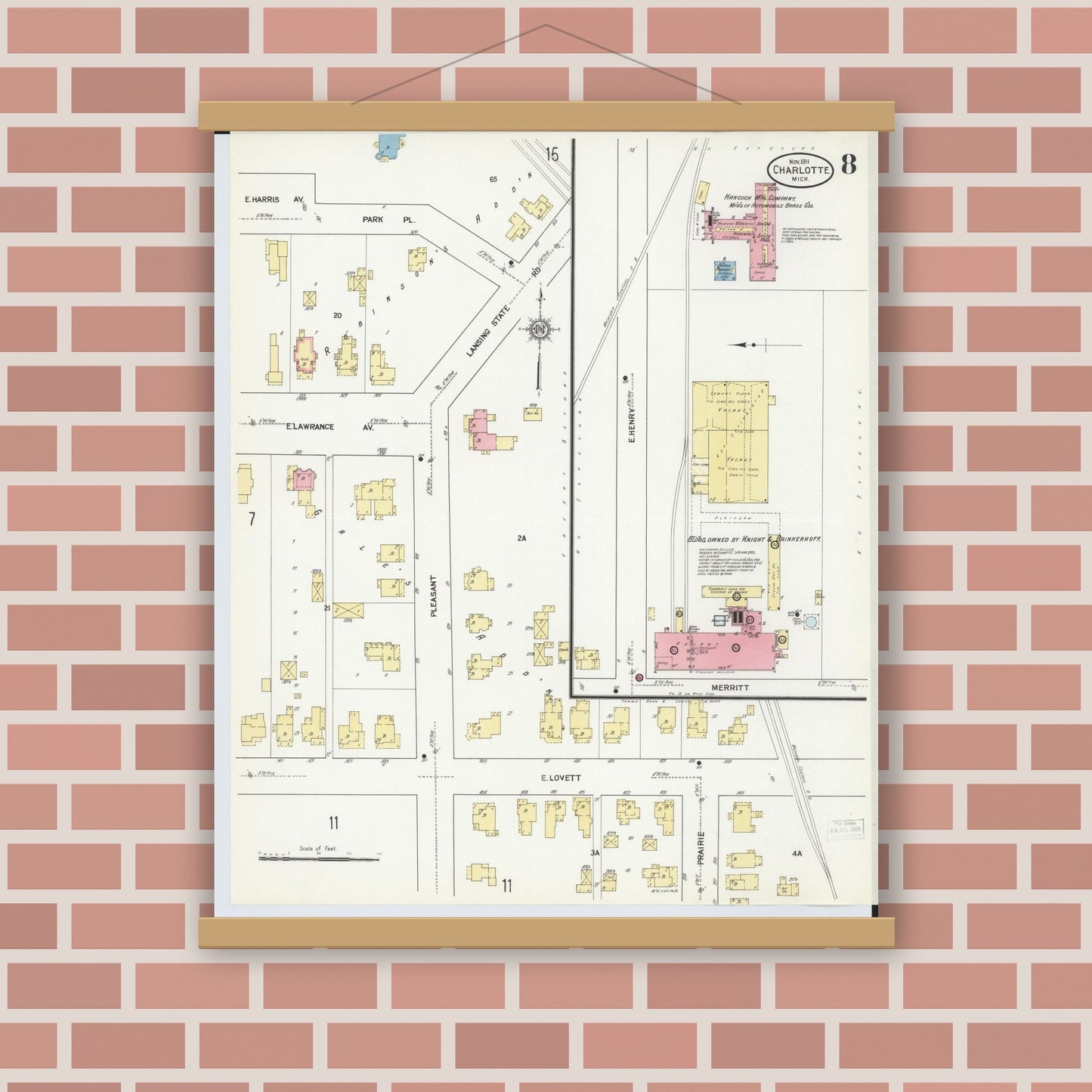 Old map wall art mockup — magnetic wood frame on brick wall — Sanborn Fire Insurance Map from Charlotte, Eaton County, Michigan (1911), Sheet #0008