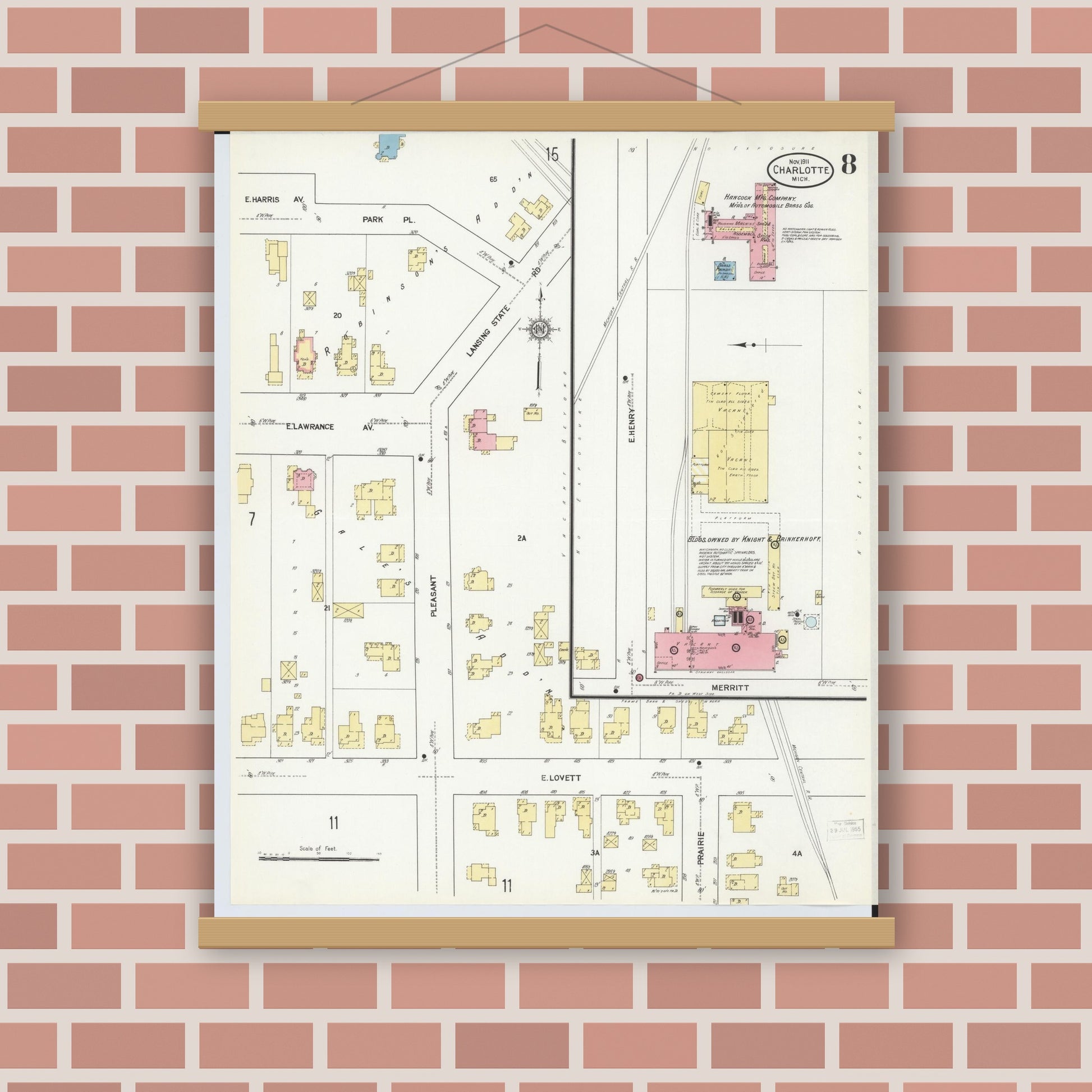 Old map wall art mockup — magnetic wood frame on brick wall — Sanborn Fire Insurance Map from Charlotte, Eaton County, Michigan (1911), Sheet #0008