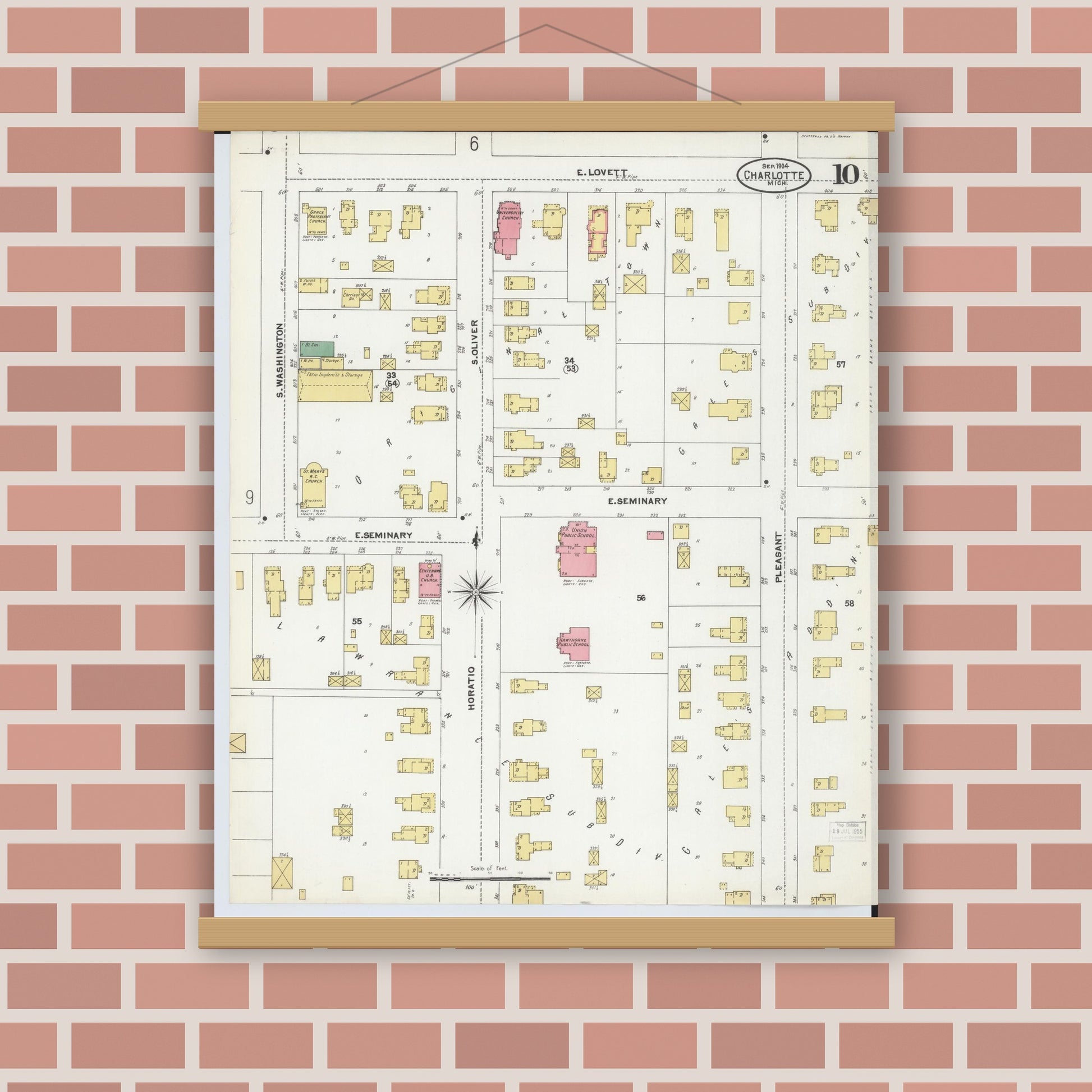 Old map wall art mockup — magnetic wood frame on brick wall — Sanborn Fire Insurance Map from Charlotte, Eaton County, Michigan (1904), Sheet #0010