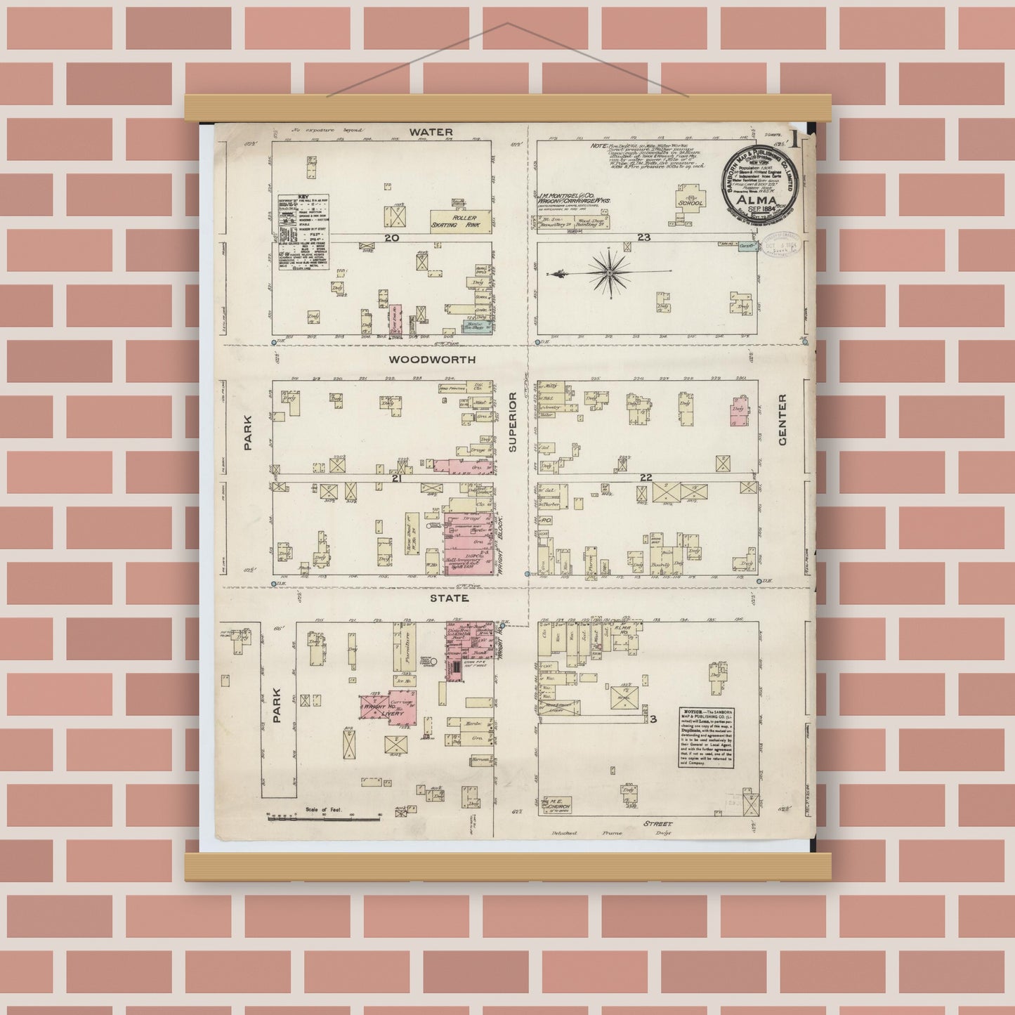 Old map wall art mockup — magnetic wood frame on brick wall — Sanborn Fire Insurance Map from Alma, Gratiot County, Michigan (1884), Sheet #0001