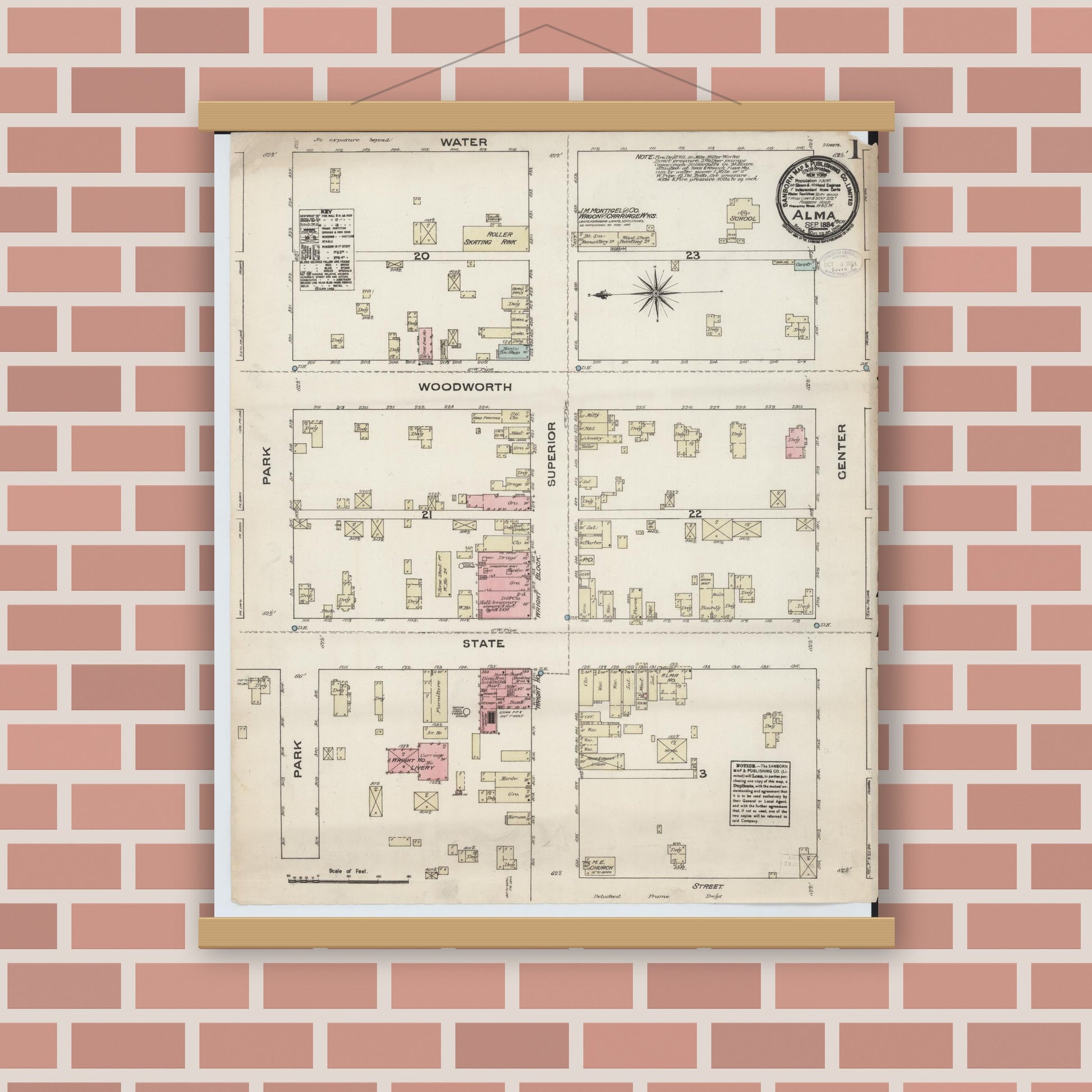 Old map wall art mockup — magnetic wood frame on brick wall — Sanborn Fire Insurance Map from Alma, Gratiot County, Michigan (1884), Sheet #0001