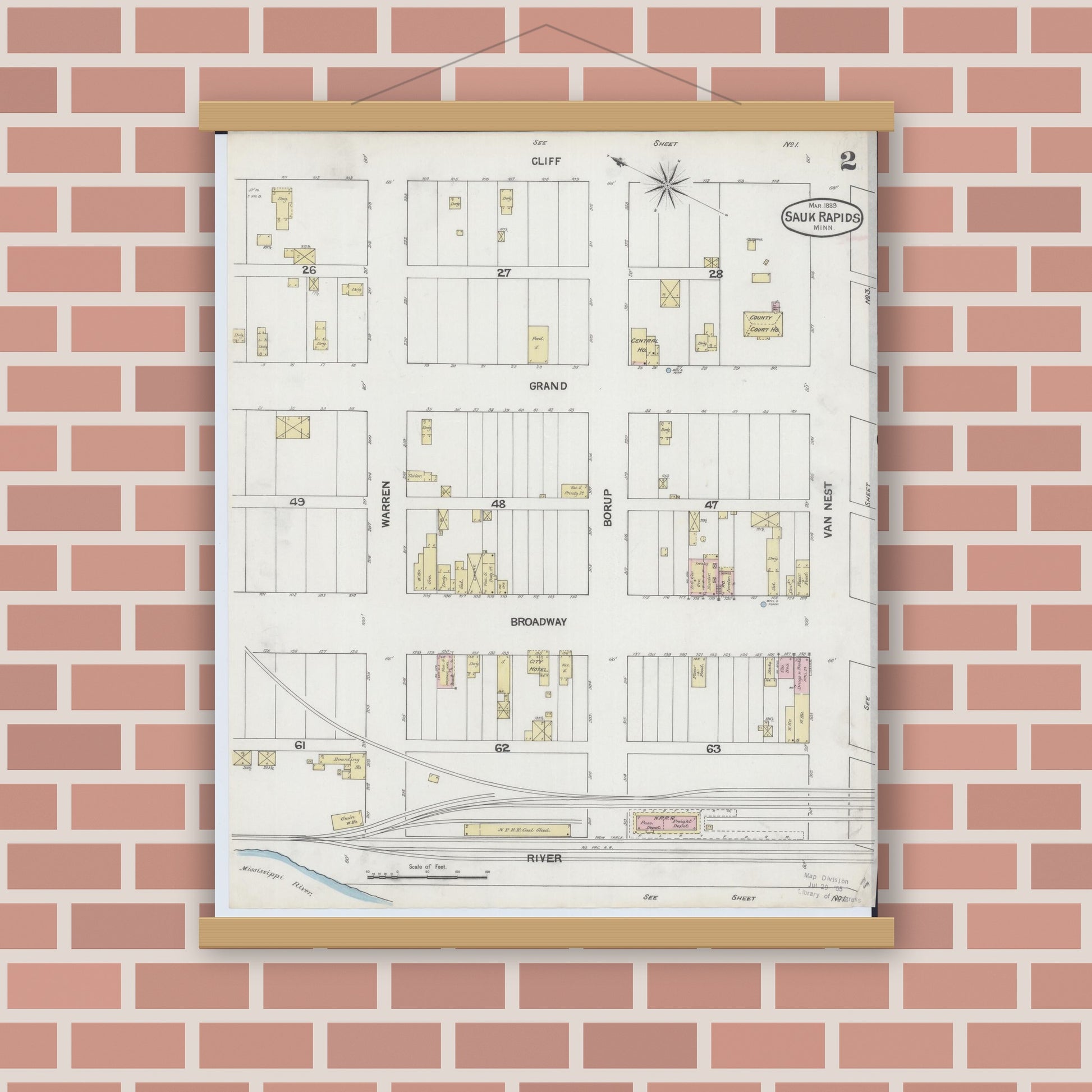 Old map wall art mockup — magnetic wood frame on brick wall — Sanborn Fire Insurance Map from Sauk Rapids, Benton County, Minnesota (1889), Sheet #0002