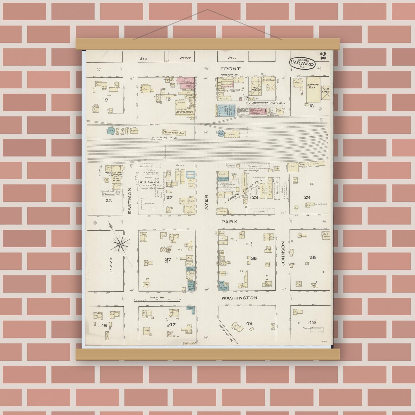Old map wall art mockup — magnetic wood frame on brick wall — Sanborn Fire Insurance Map from Harvard, McHenry County, Illinois (1885), Sheet #0002