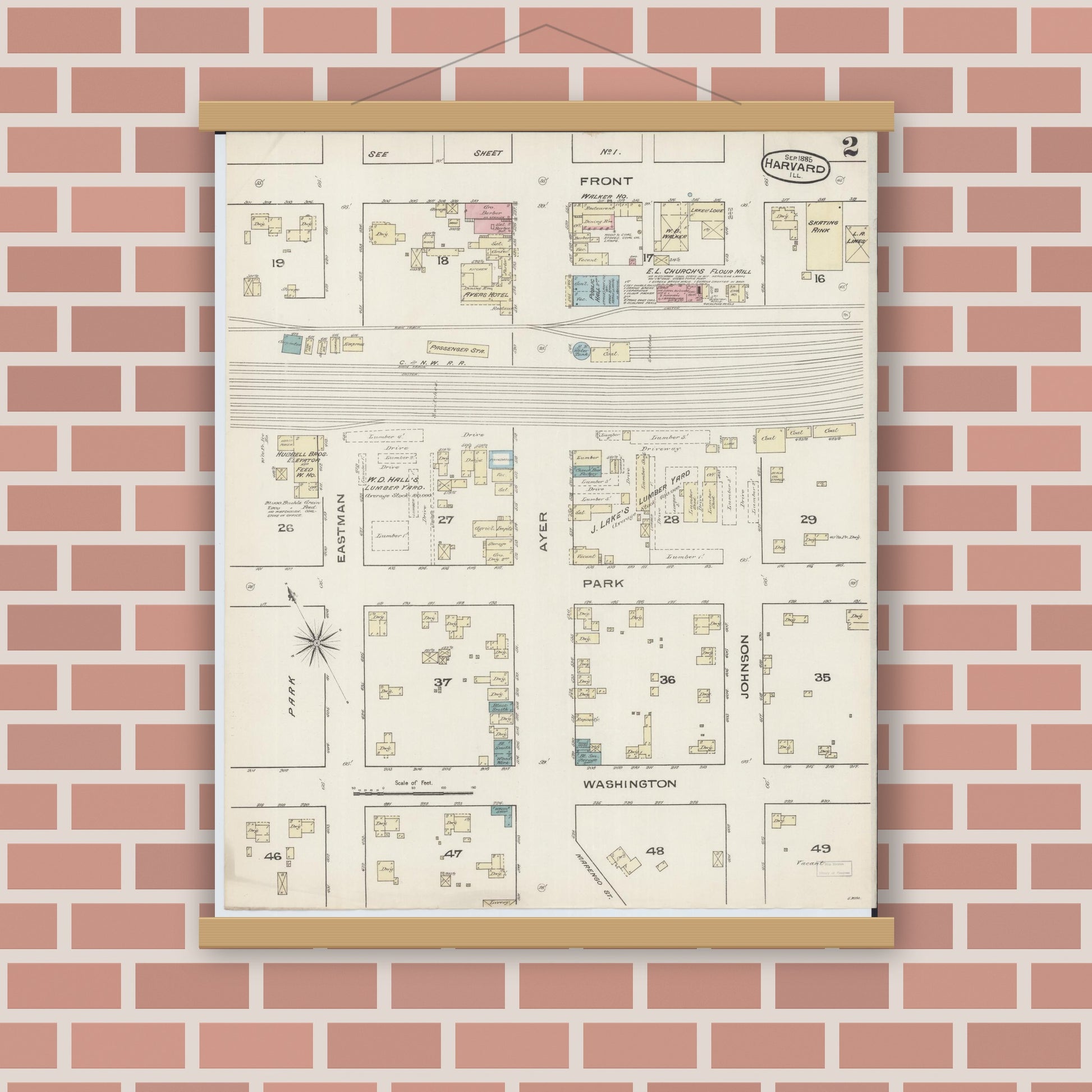 Old map wall art mockup — magnetic wood frame on brick wall — Sanborn Fire Insurance Map from Harvard, McHenry County, Illinois (1885), Sheet #0002
