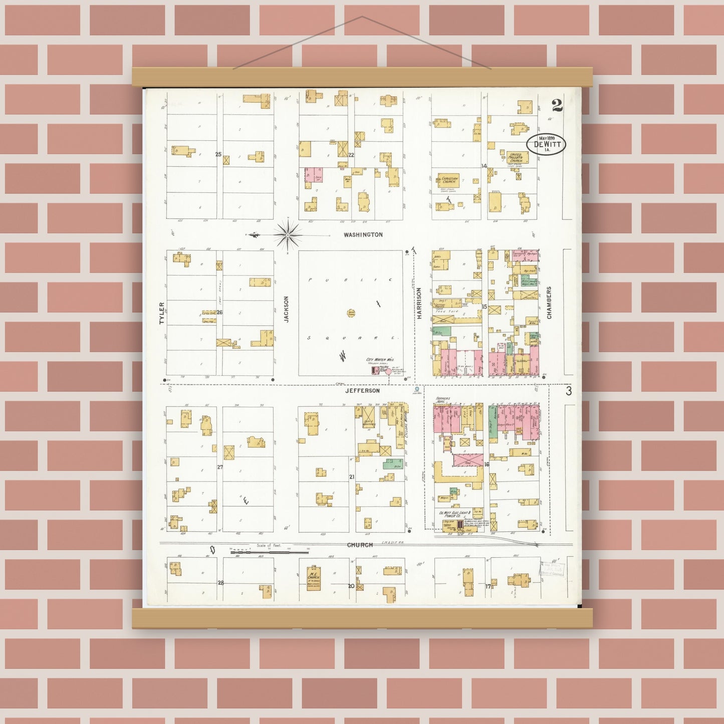 Old map wall art mockup — magnetic wood frame on brick wall — Sanborn Fire Insurance Map from De Witt, Clinton County, Iowa (1899), Sheet #0002