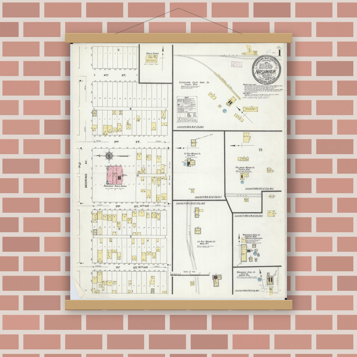 Old map wall art mockup — magnetic wood frame on brick wall — Sanborn Fire Insurance Map from Nashwauk, Itasca County, Minnesota (1909), Sheet #0001