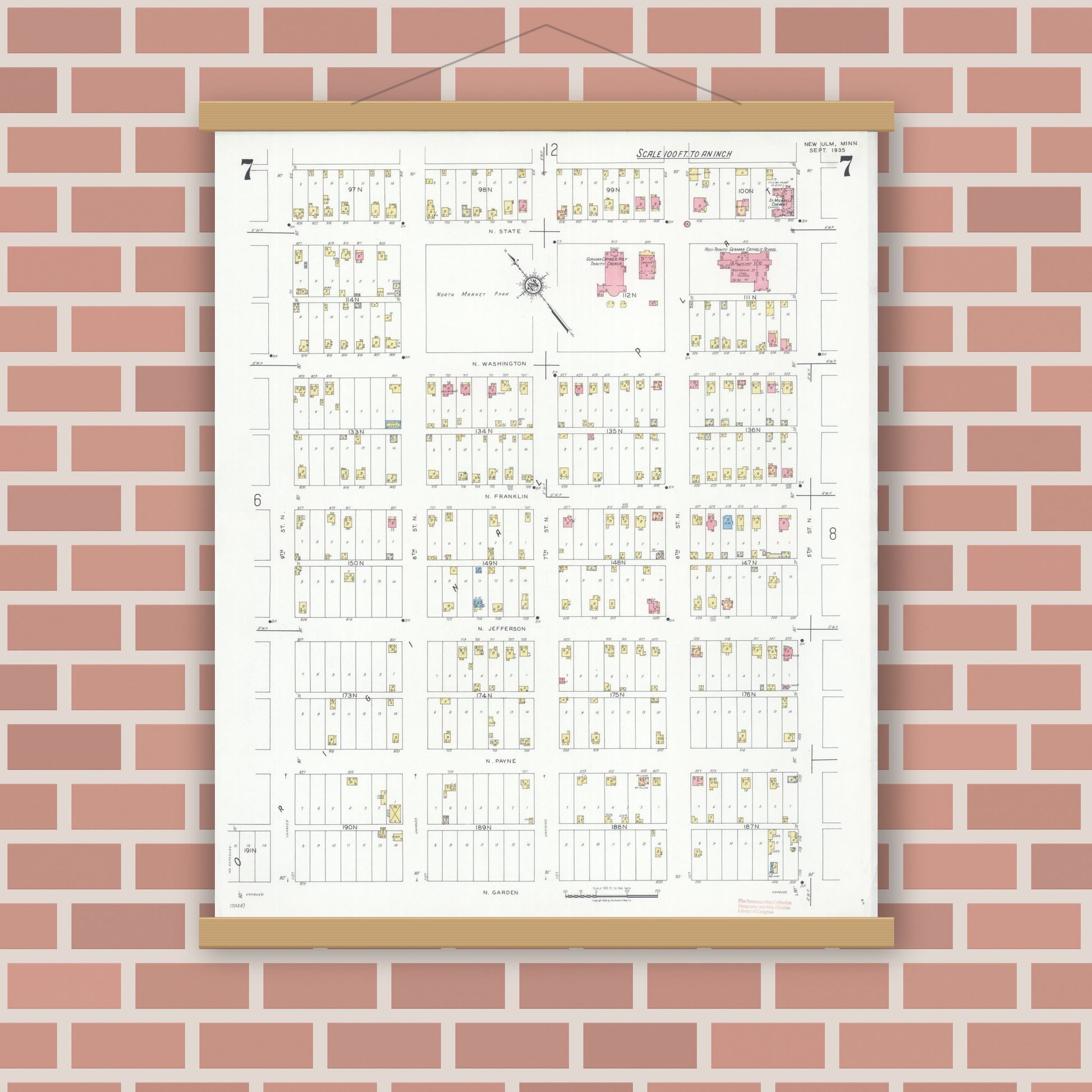 Old map wall art mockup — magnetic wood frame on brick wall — Sanborn Fire Insurance Map from New Ulm, Brown County, Minnesota (1935), Sheet #0007